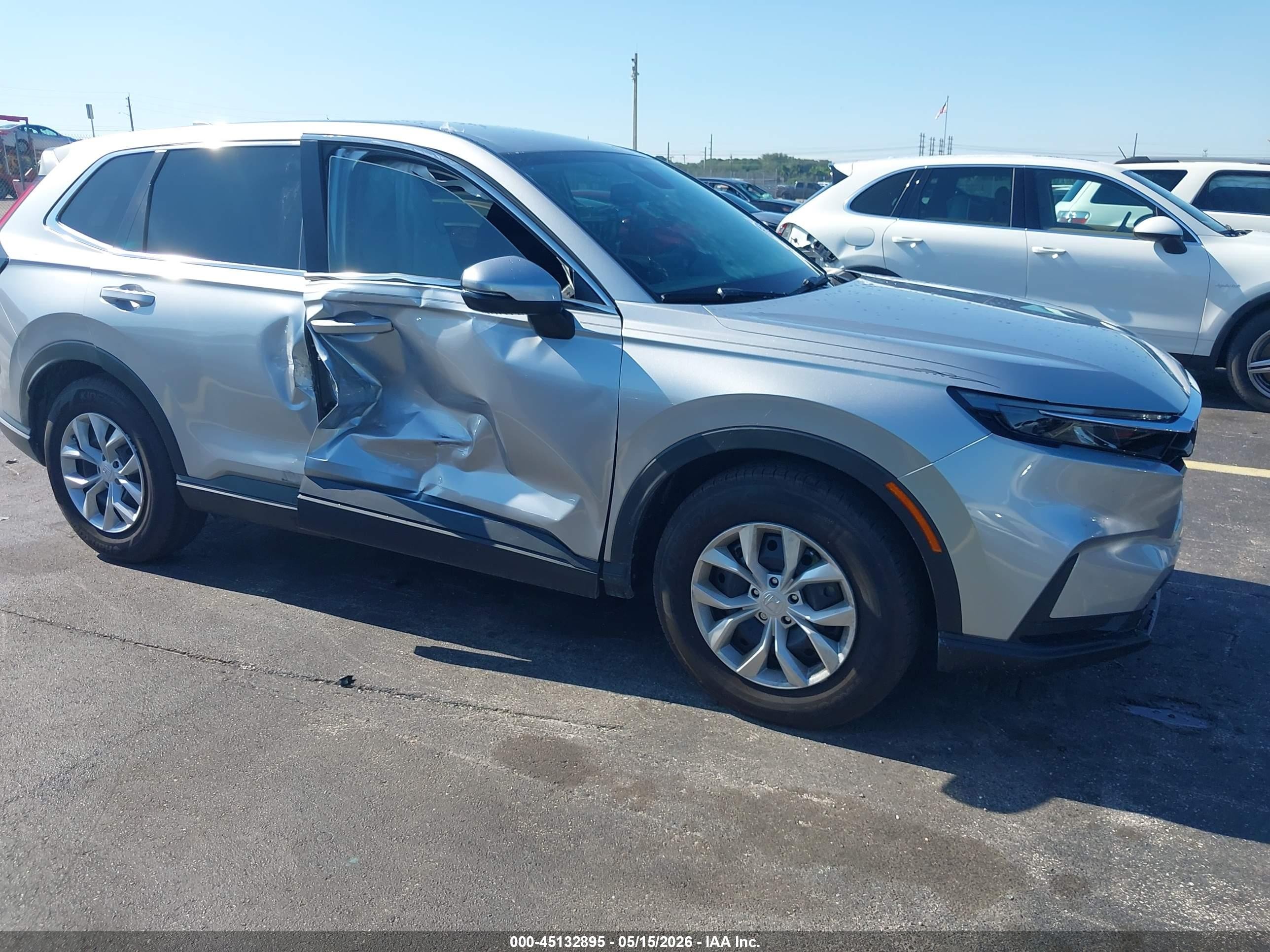 2026 Honda CR-V LX, VIN 2HKRS3H20TH330107 — Side