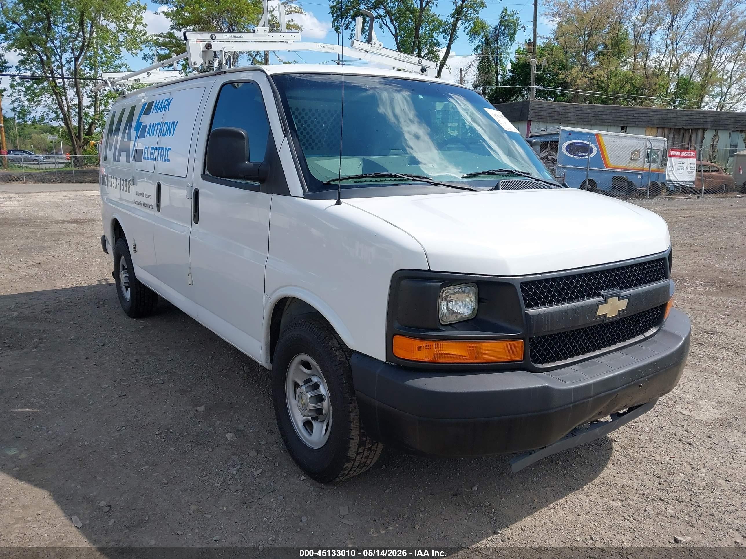 2011 Chevrolet Express Cargo, VIN 1GCWGFCA1B1184875 — Side