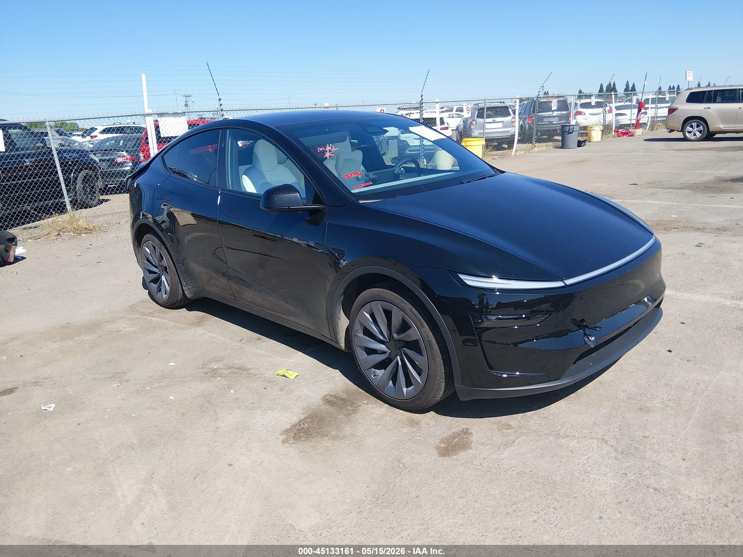 2026 Tesla Model Y Long Range Launch Series, VIN 7SAYGDEE8TF605399 — Rear end