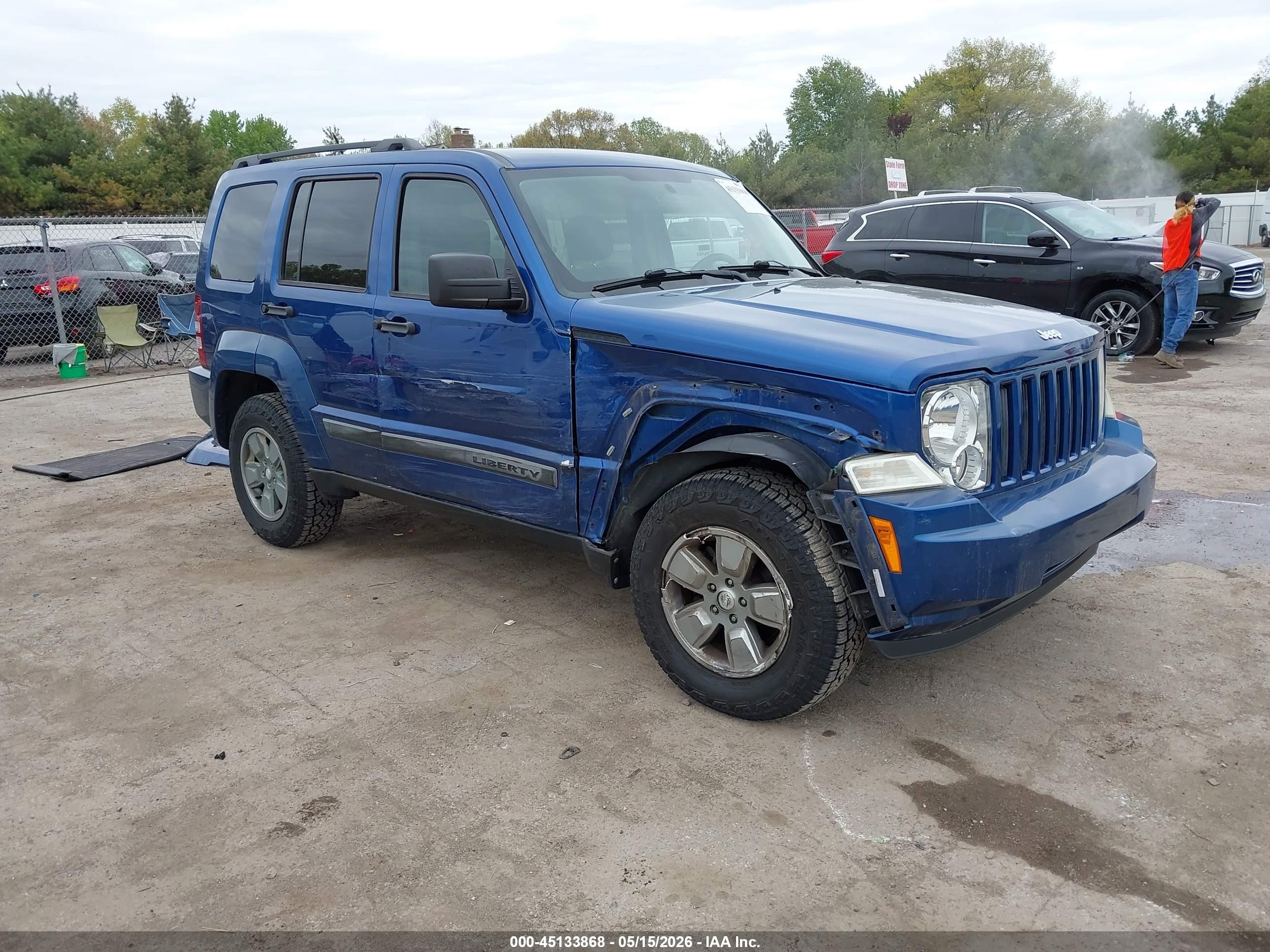 2010 Jeep Liberty Sport, VIN 1J4PN2GK3AW176956 — Side