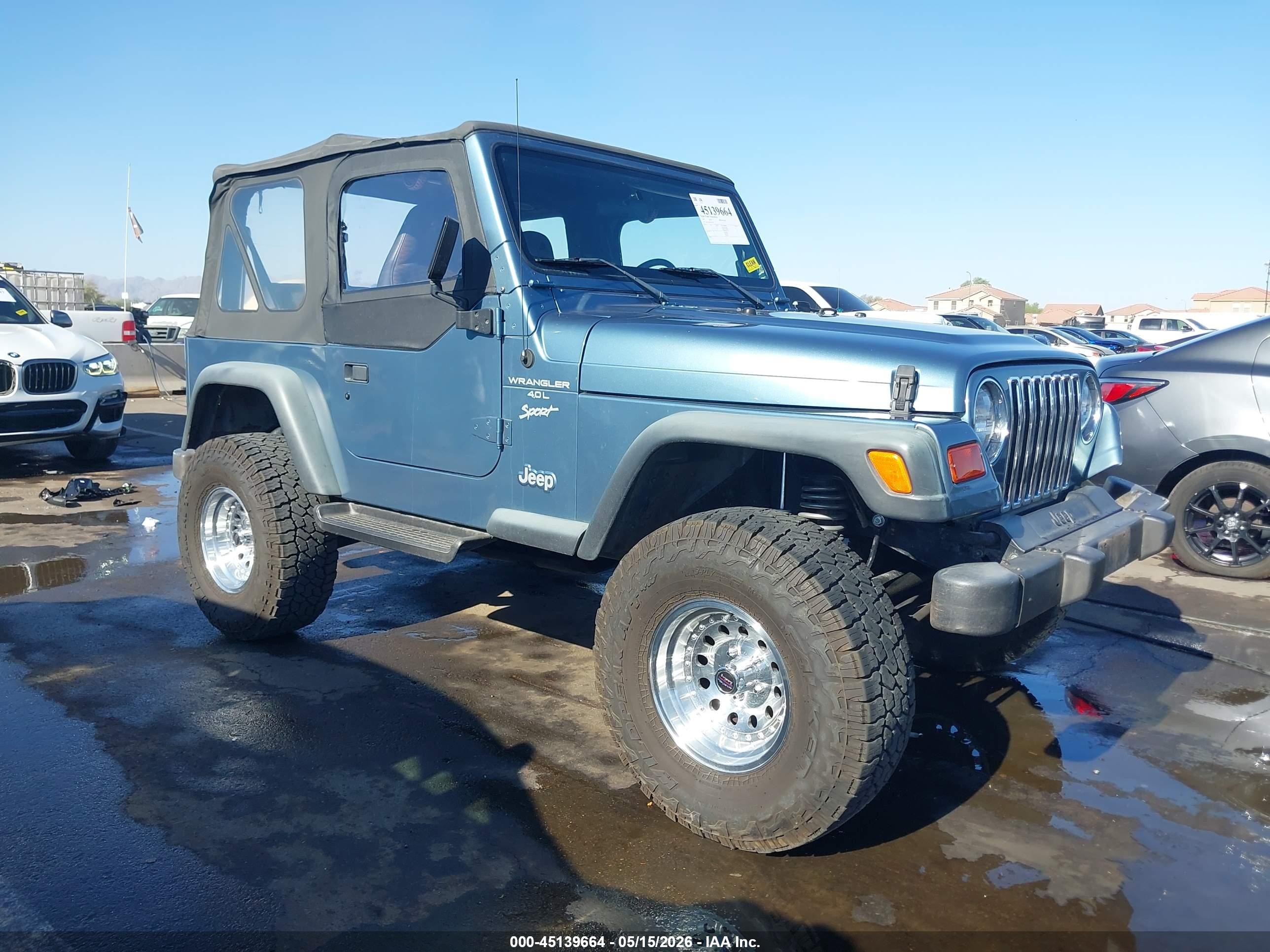 1999 Jeep Wrangler Sport, VIN 1J4FY19S2XP467347 — Front end