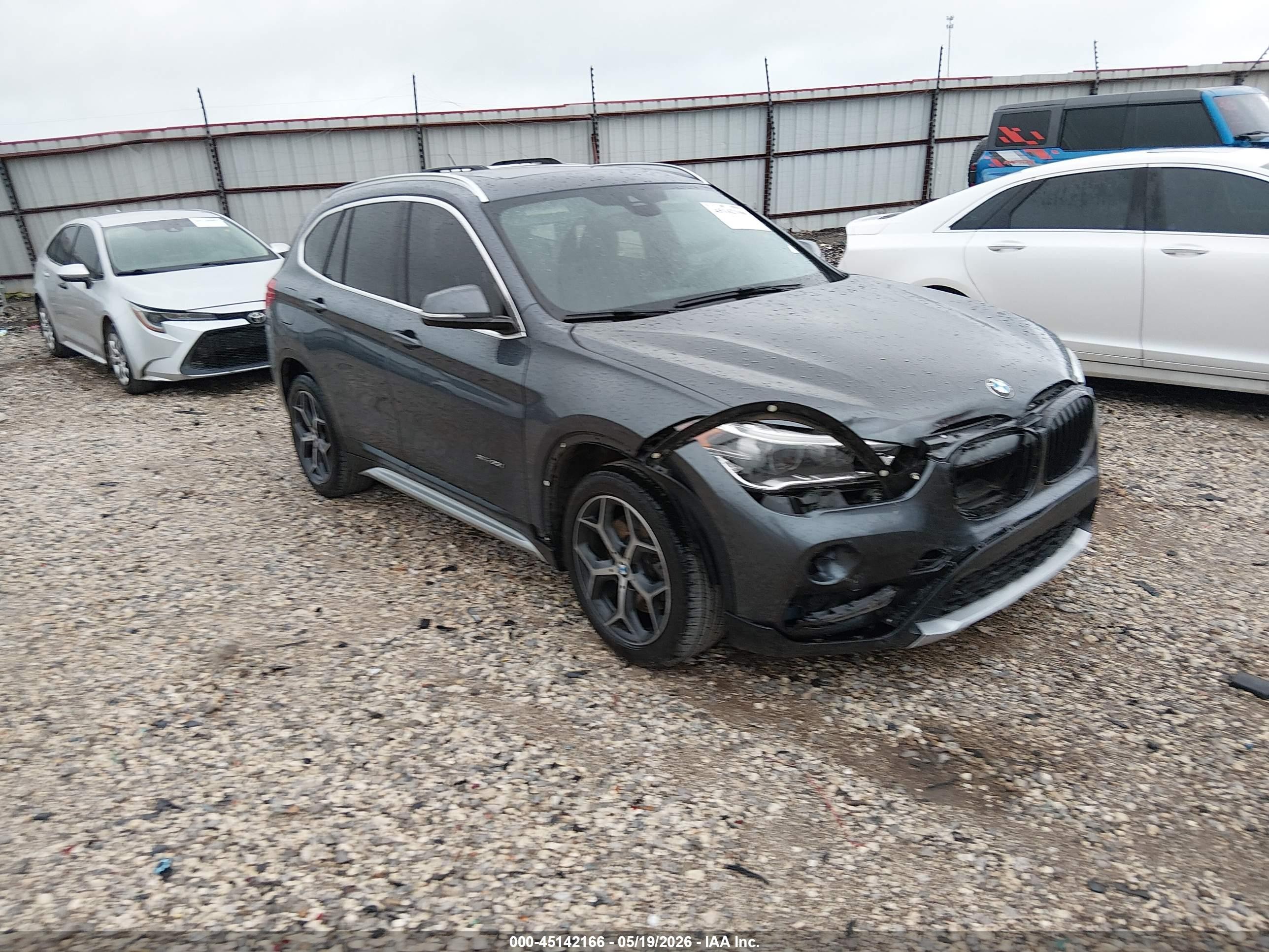2018 BMW X1 xDrive28i, VIN WBXHT3C30J5K21459 — Front end