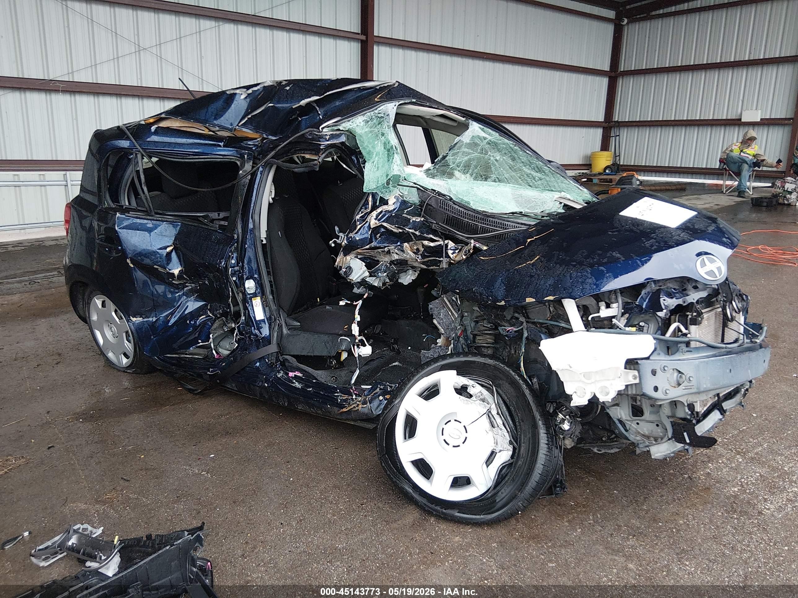 2013 Scion xD, VIN JTKKUPB48D1034248 — Side
