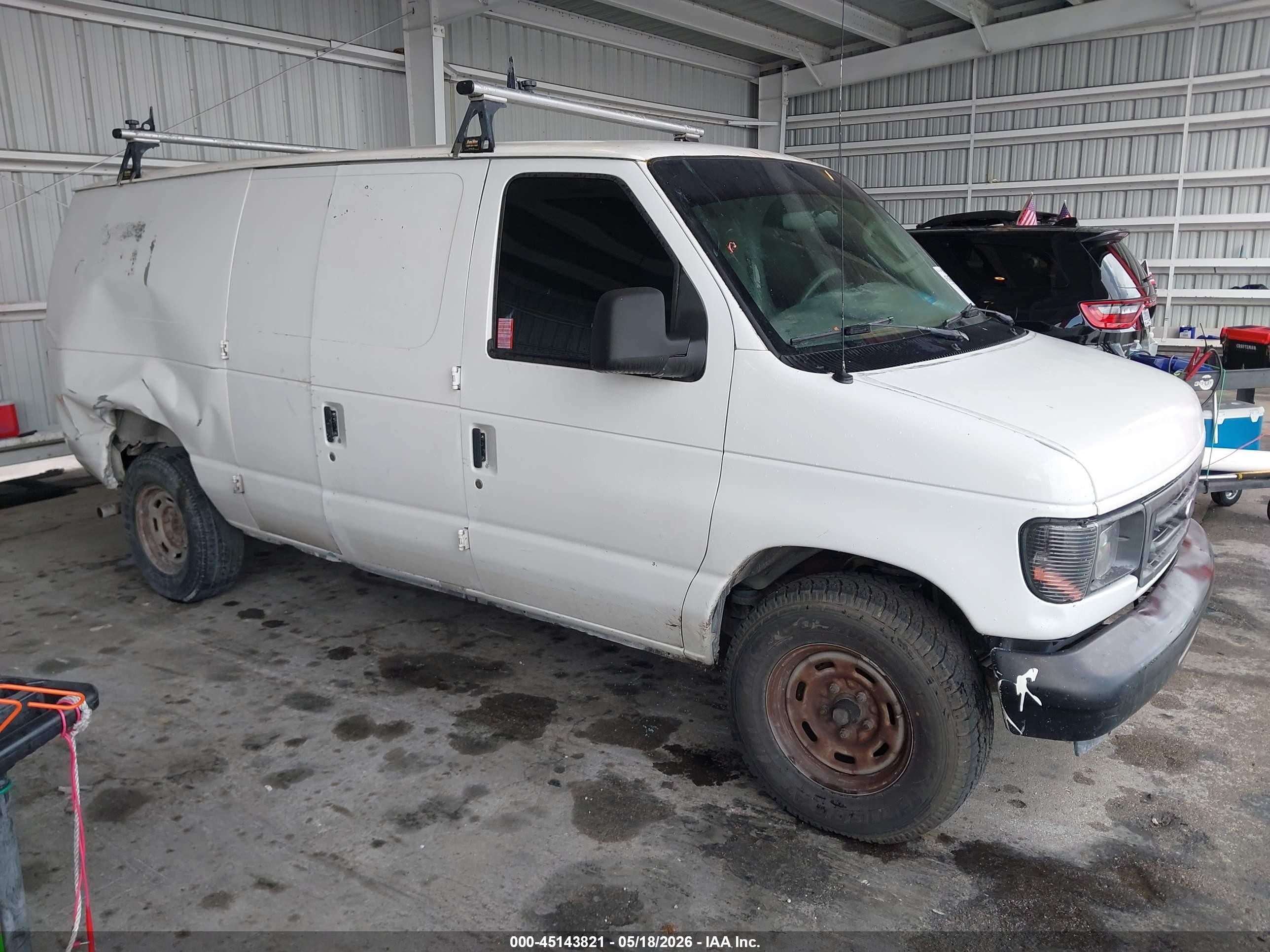 2006 Ford Econoline Cargo, VIN 1FTRE14W06DA23695 — Rear end