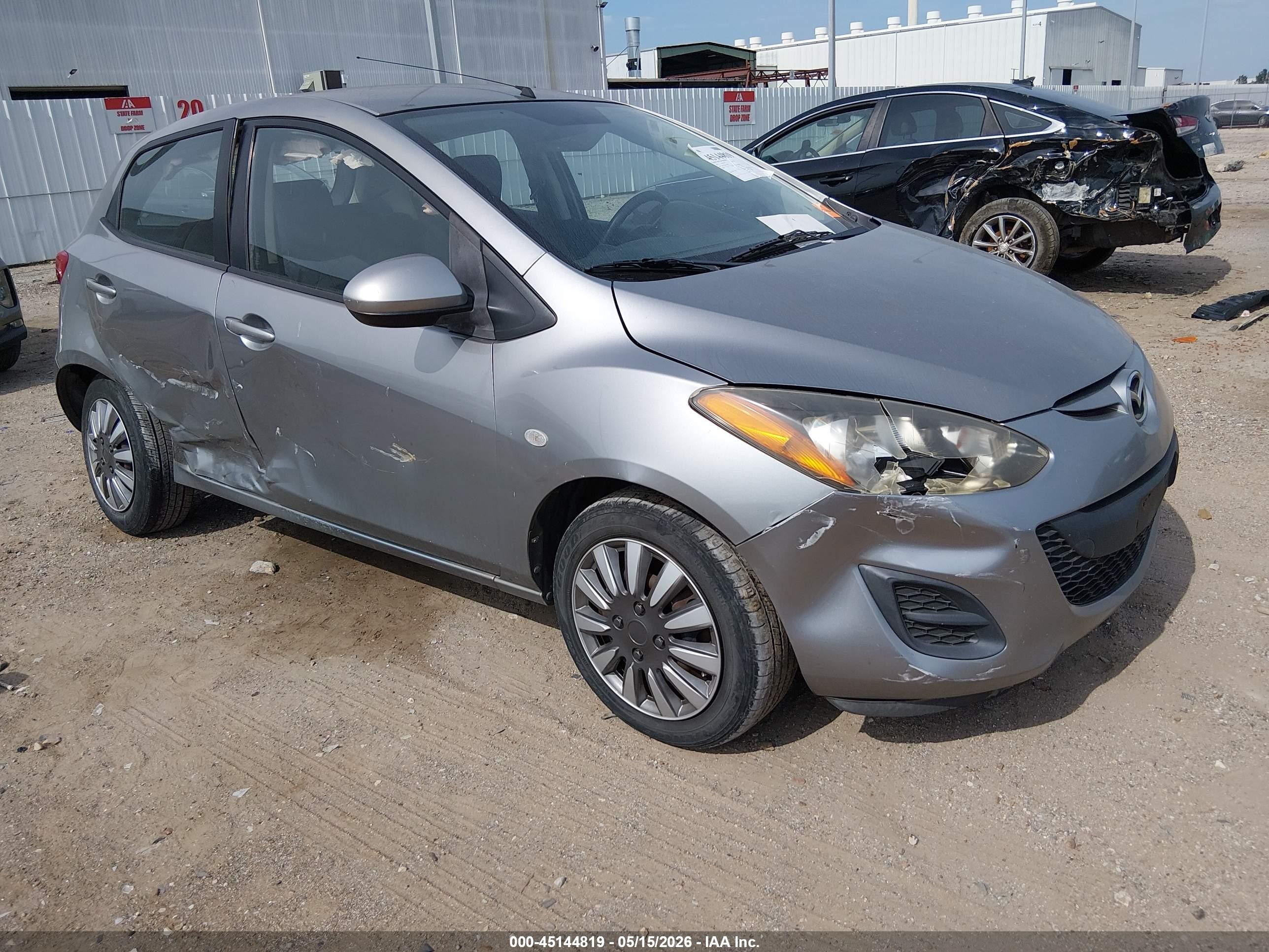 2013 Mazda 2 Sport, VIN JM1DE1KY8D0167823 — Side