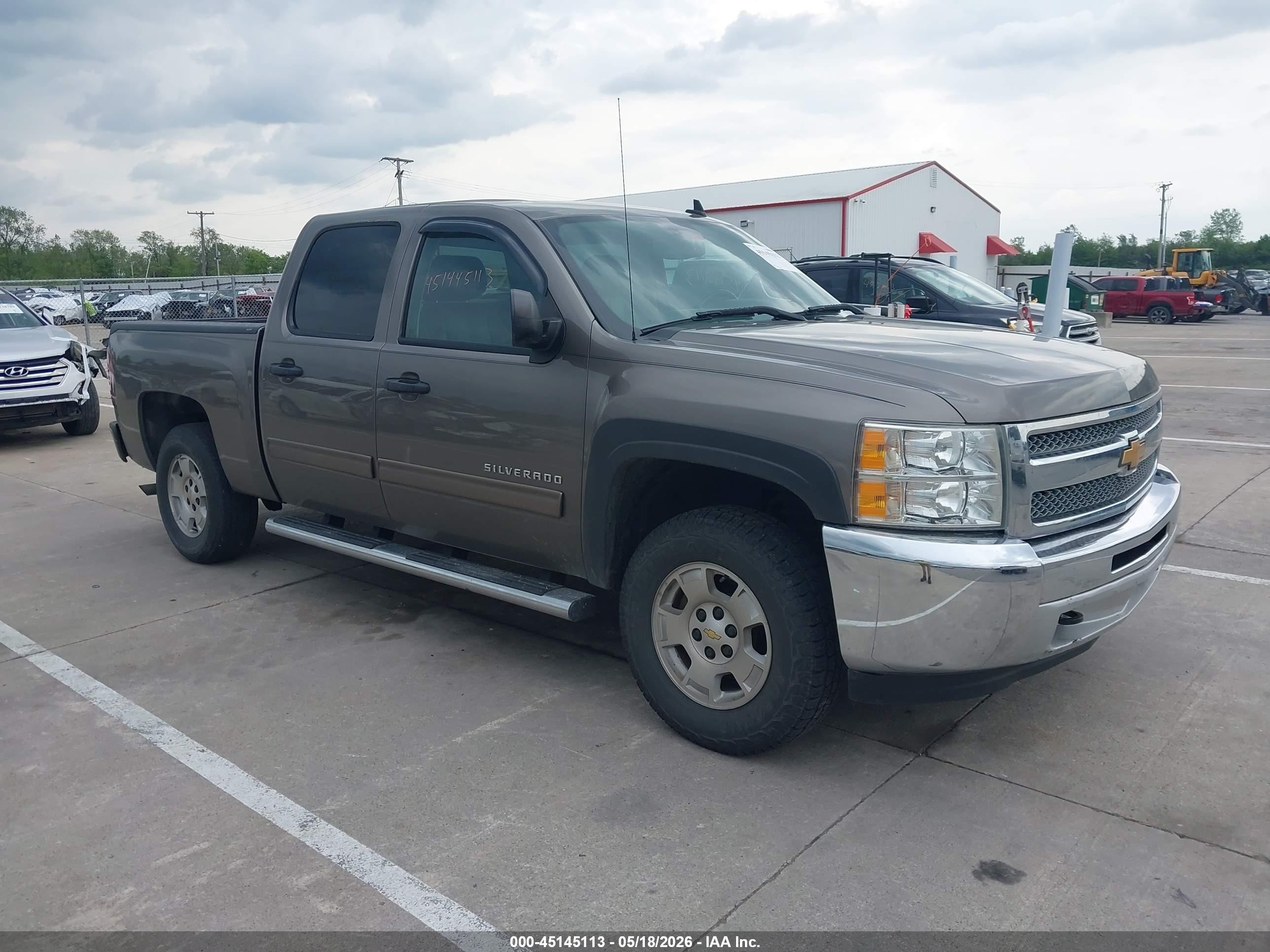 2013 Chevrolet Silverado 1500 LT, VIN 3GCPKSE79DG125512 — Side
