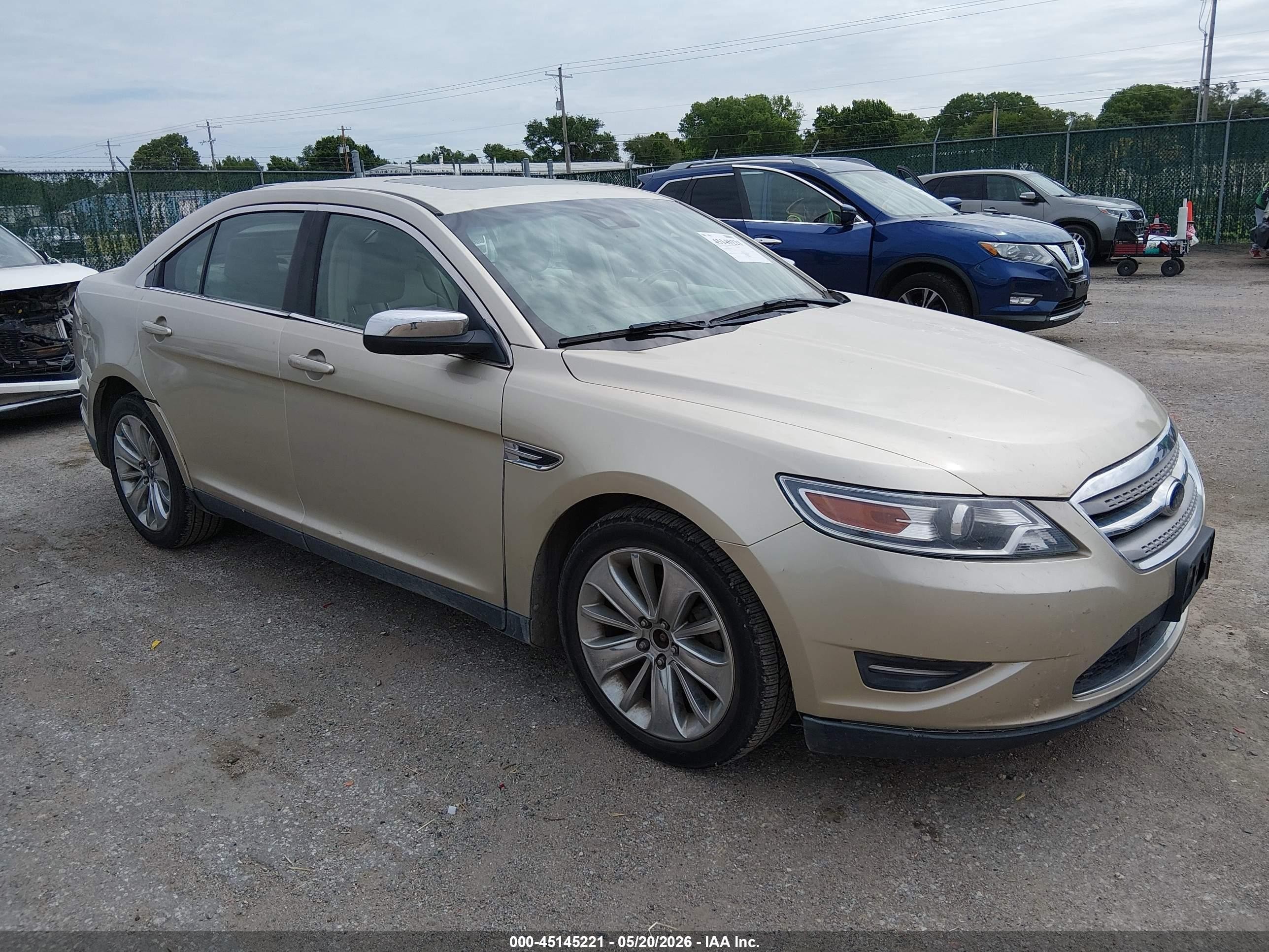 2010 Ford Taurus Limited, VIN 1FAHP2JW0AG116892 — Side