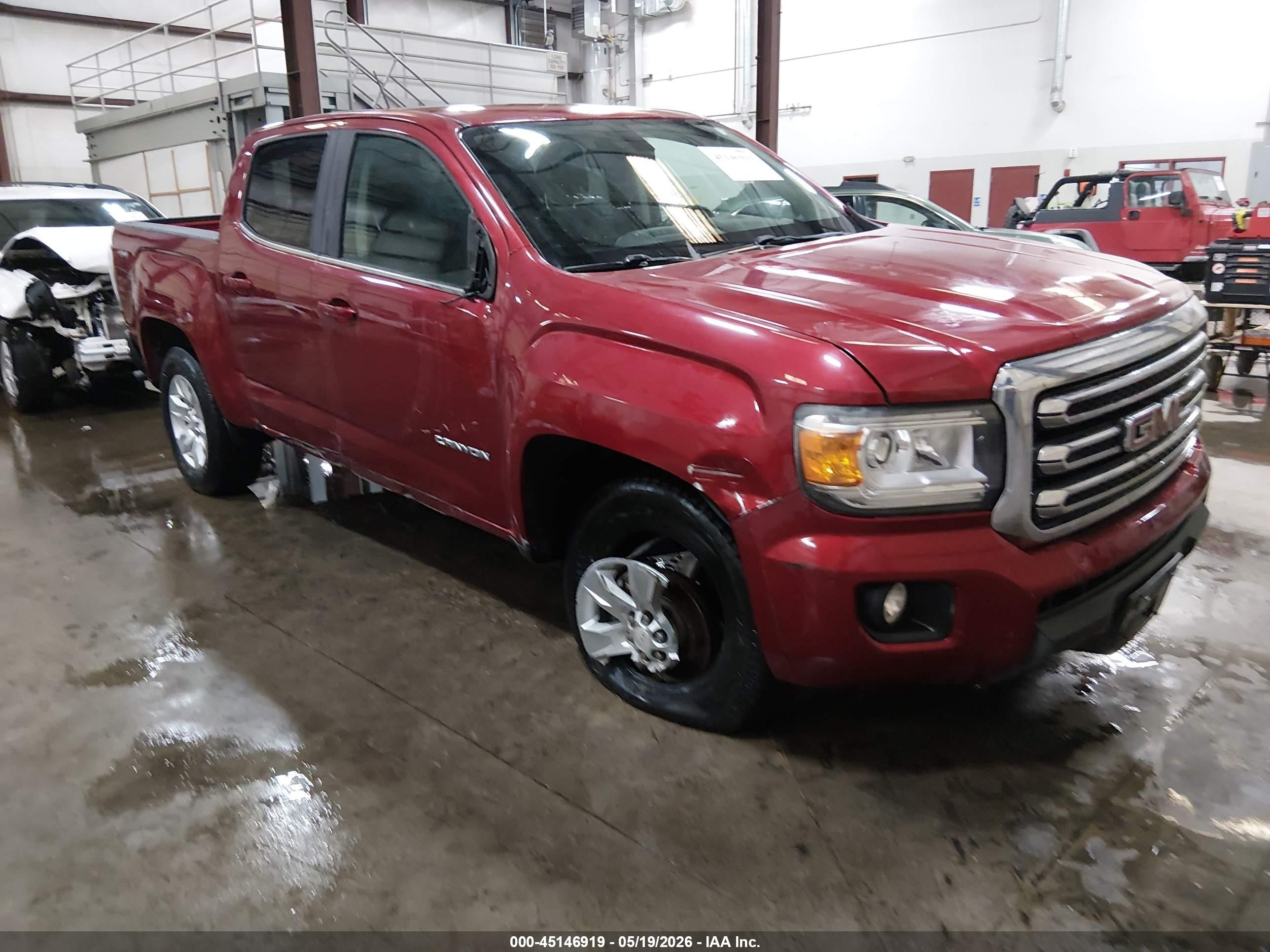 2017 GMC Canyon 4WD SLE, VIN 1GTG6CEN9H1282907 — Side