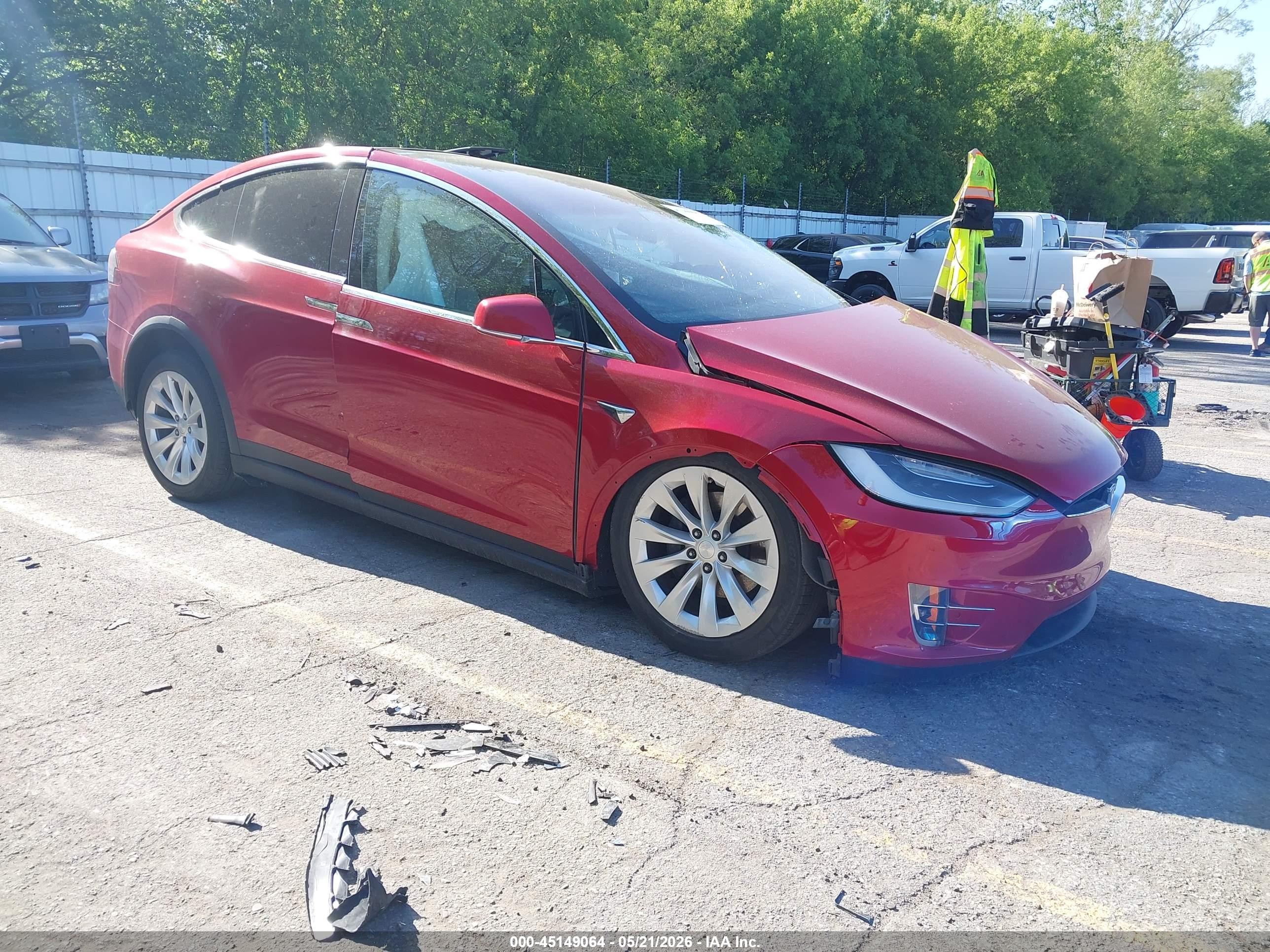 2019 Tesla Model X 75D, VIN 5YJXCDE25KF157373 — Side
