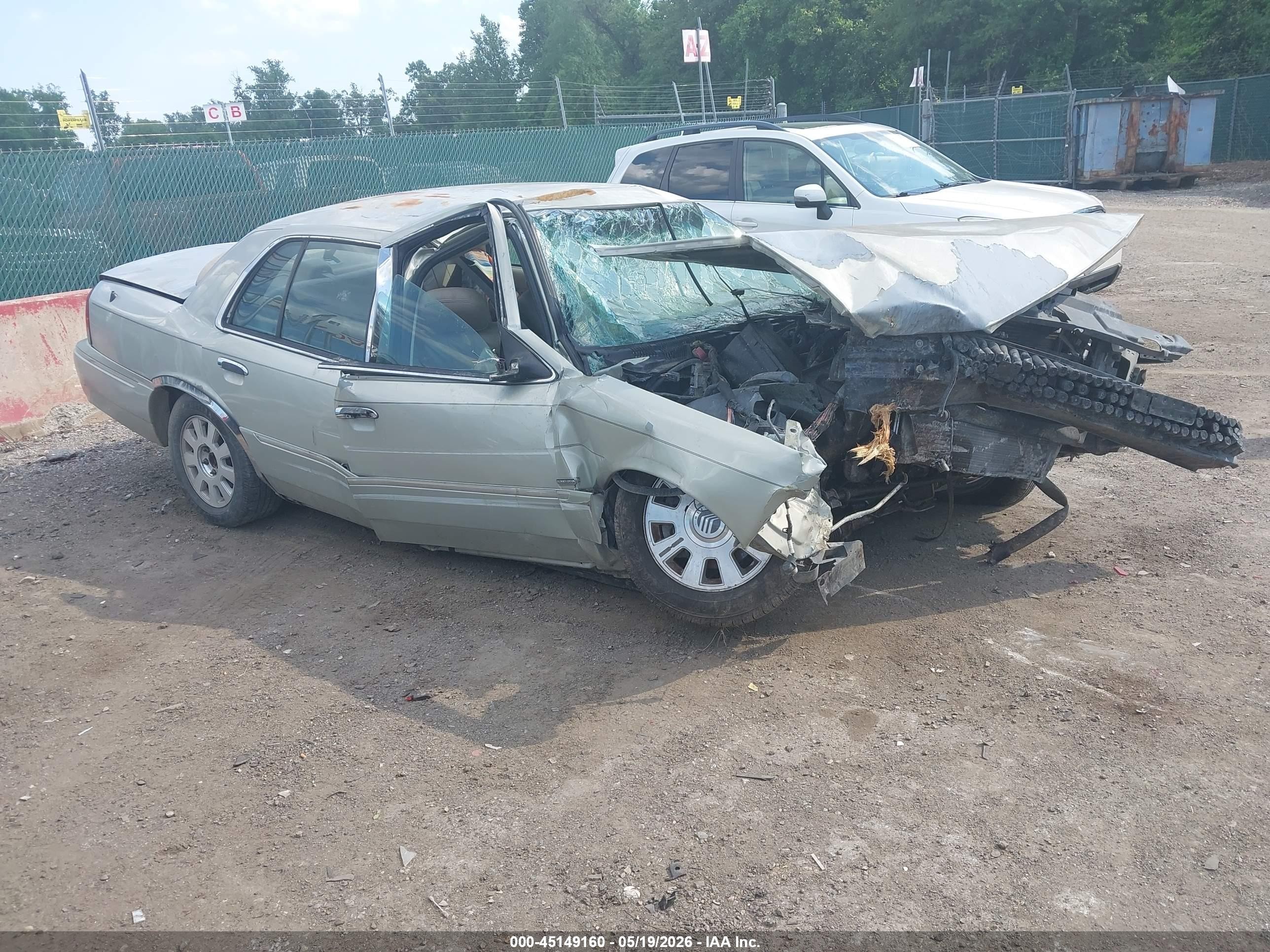 2005 Mercury Grand Marquis LS Premium, VIN 2MEFM75W95X651543 — Rollover