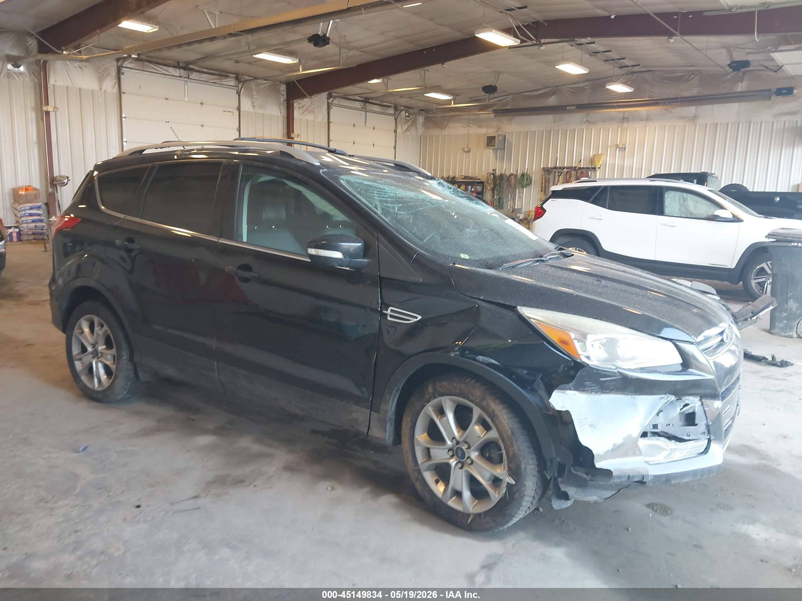 2016 Ford Escape Titanium, VIN 1FMCU9JX2GUA08729 — Опрокидывание