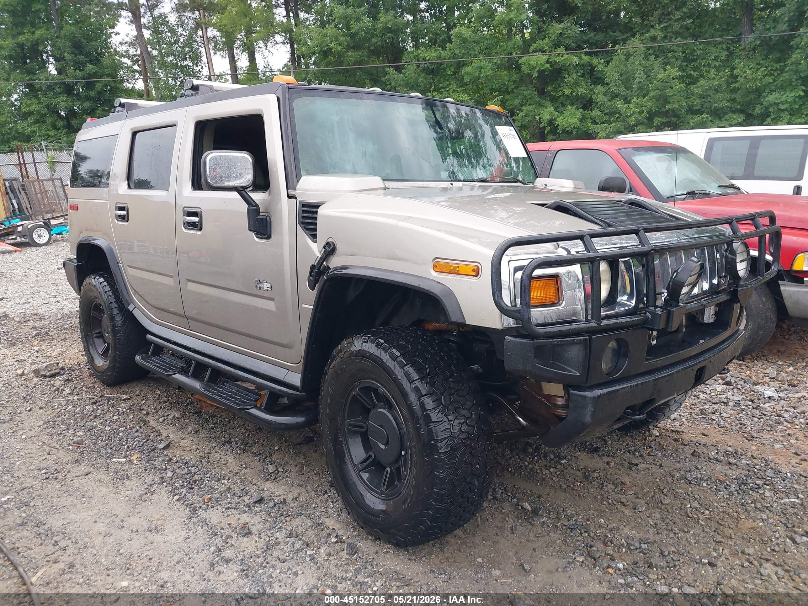 2003 Hummer H2, VIN 5GRGN23U03H125580 — Side