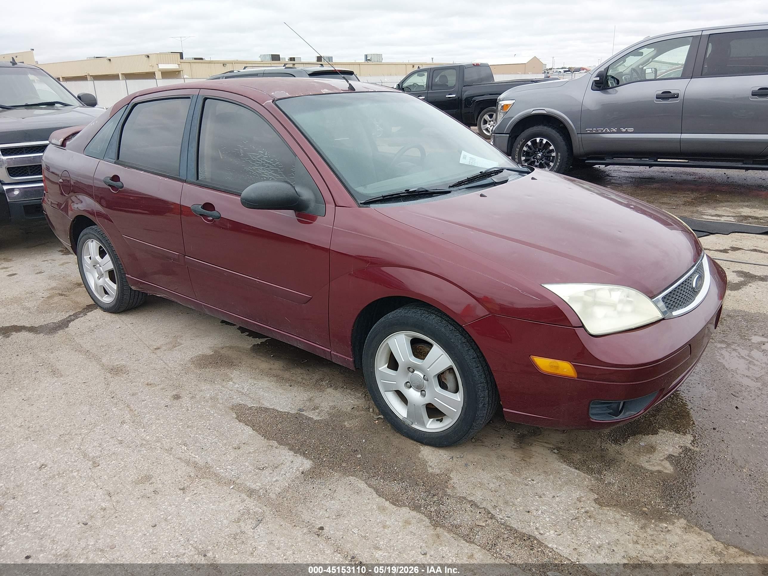 2006 Ford Focus S, VIN 1FAFP34N16W103856 — Hail