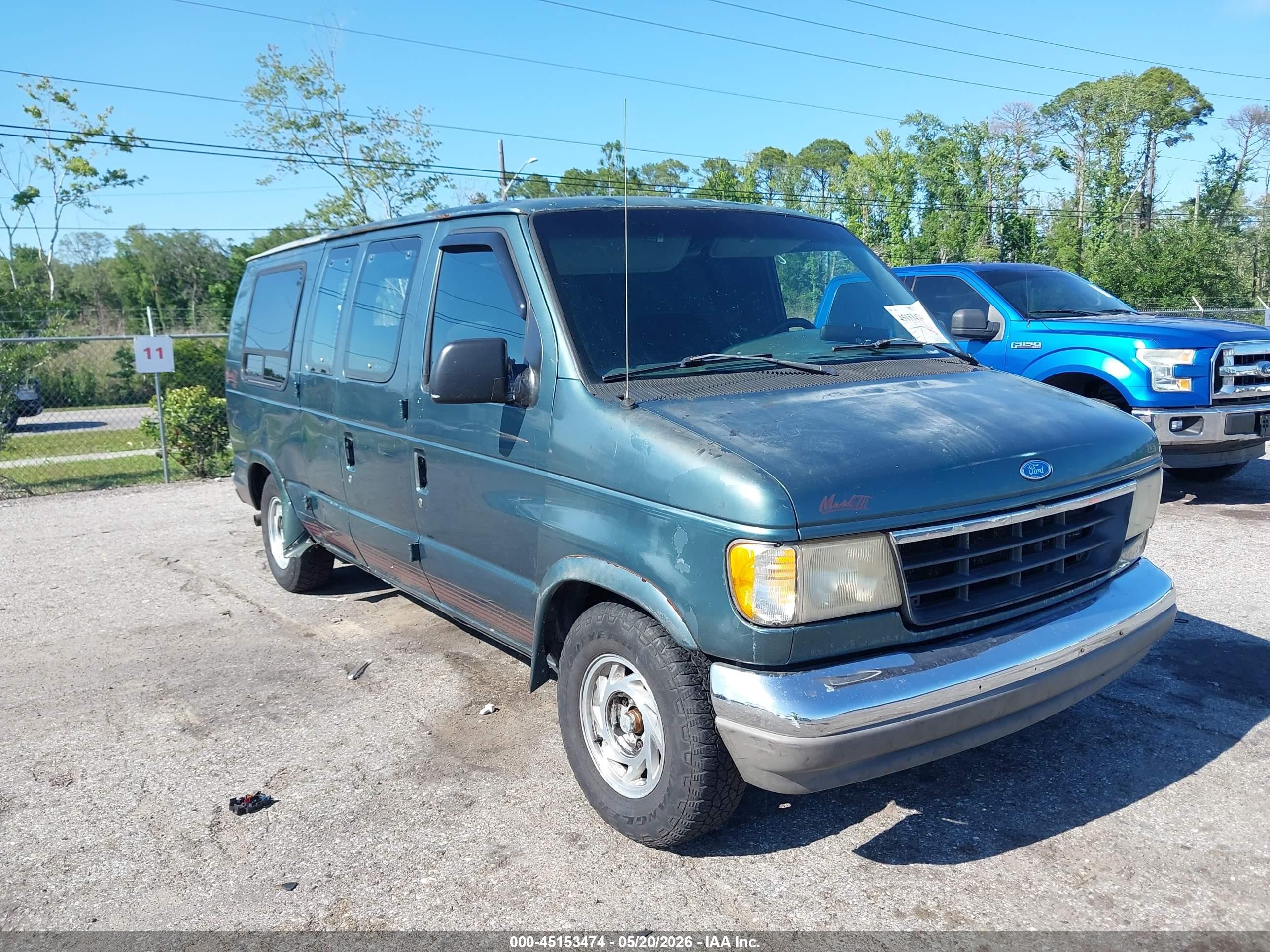1996 Ford Econoline Cargo, VIN 1FDEE14H5THA98716 — Side