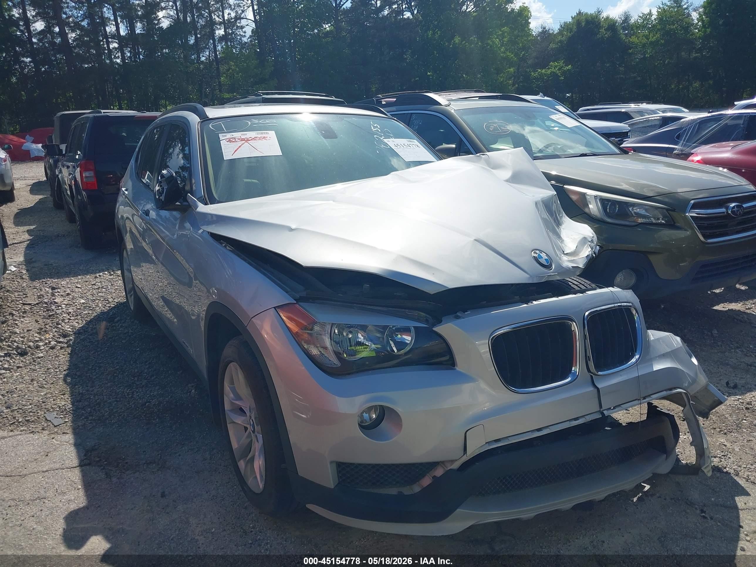 2015 BMW X1 xDrive28i, VIN WBAVL1C53FVY39823 — Front end