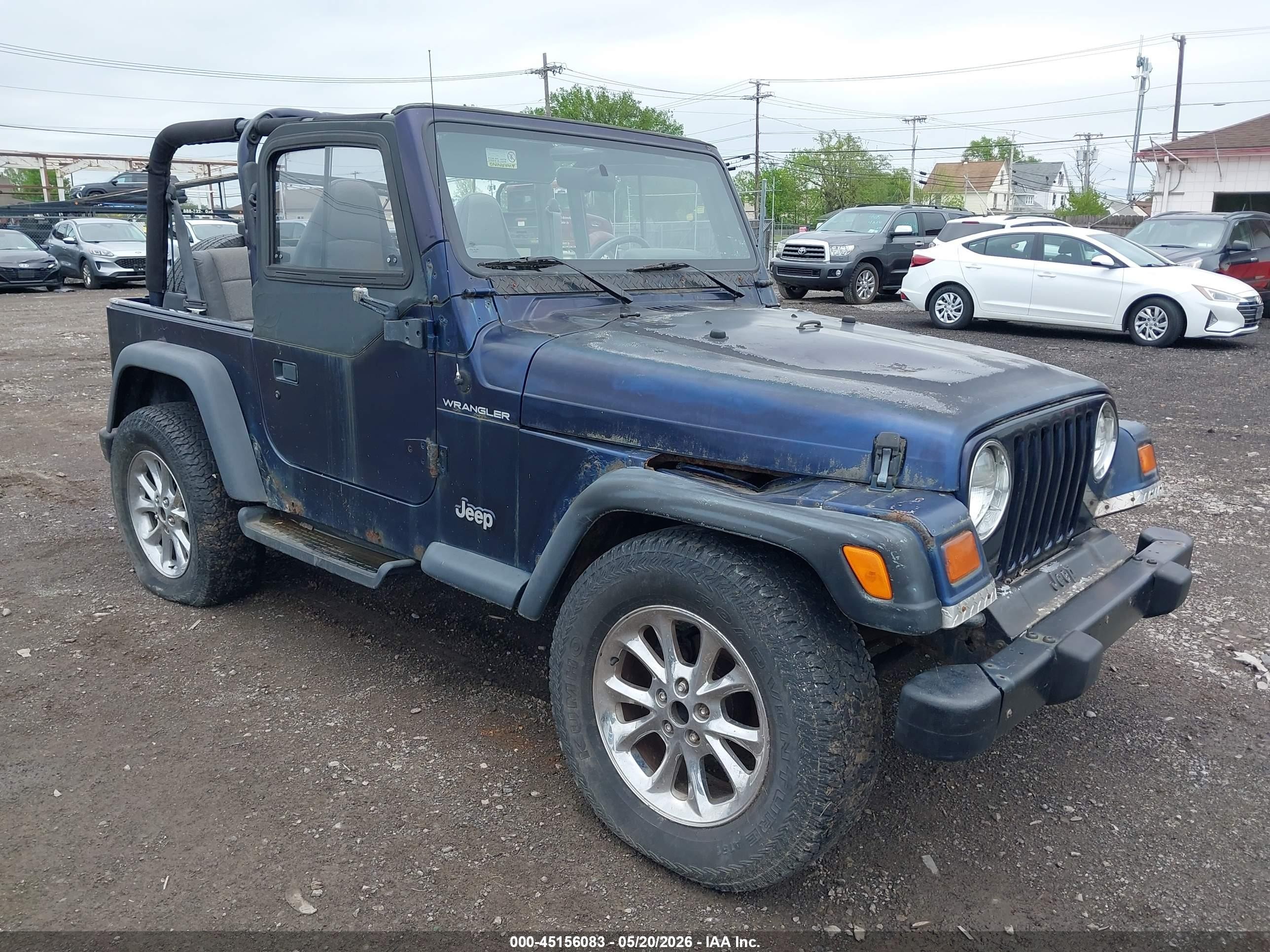 1999 Jeep Wrangler SE, VIN 1J4FY29P3XP475183 — Normal wear