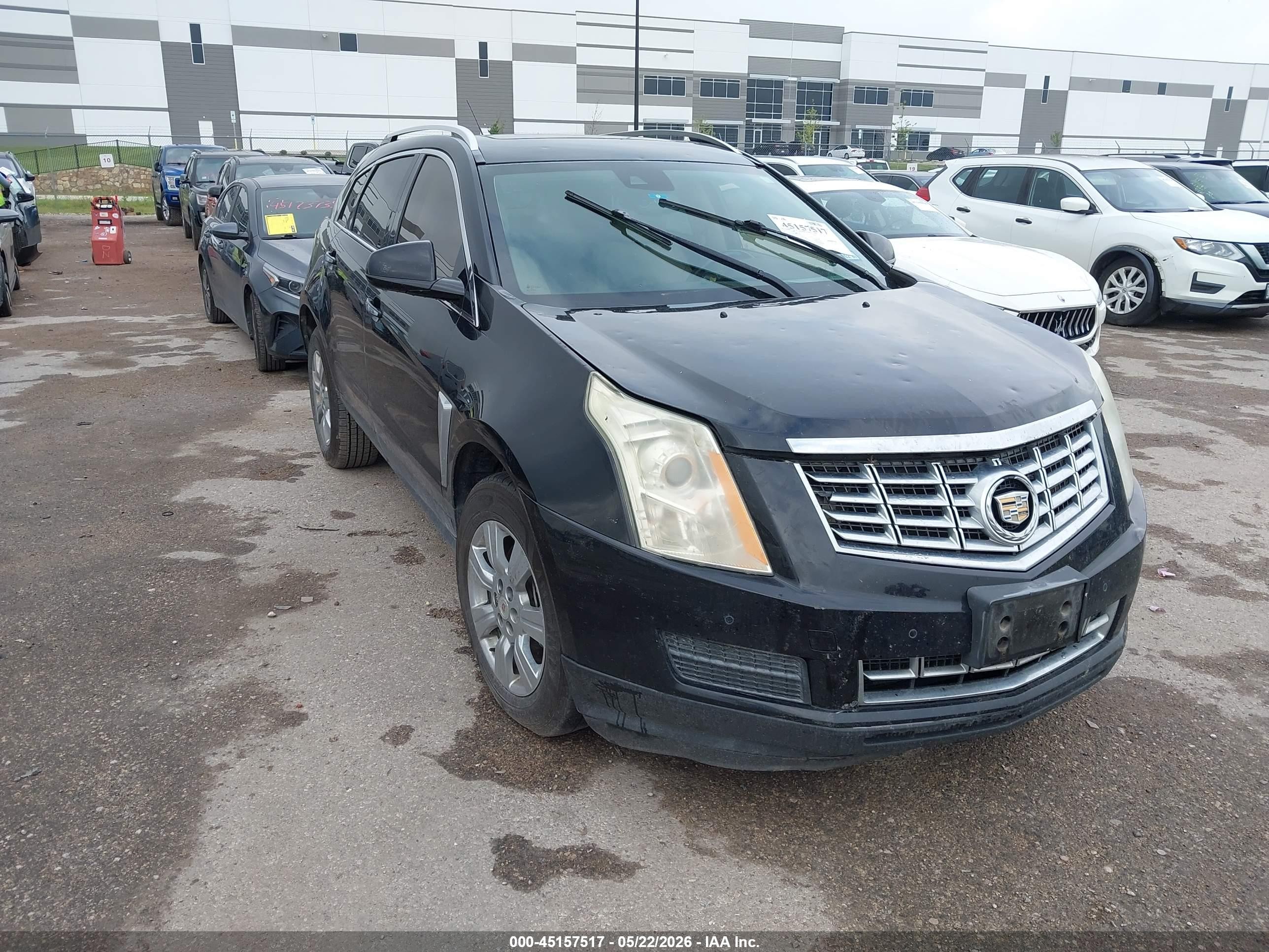 2015 Cadillac SRX Luxury Collection, VIN 3GYFNBE38FS536698 — Hail