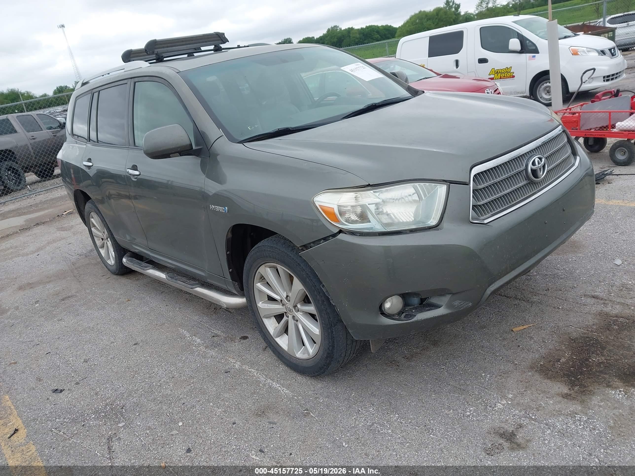 2010 Toyota Highlander Limited, VIN JTEJW3EH6A2041429 — Side