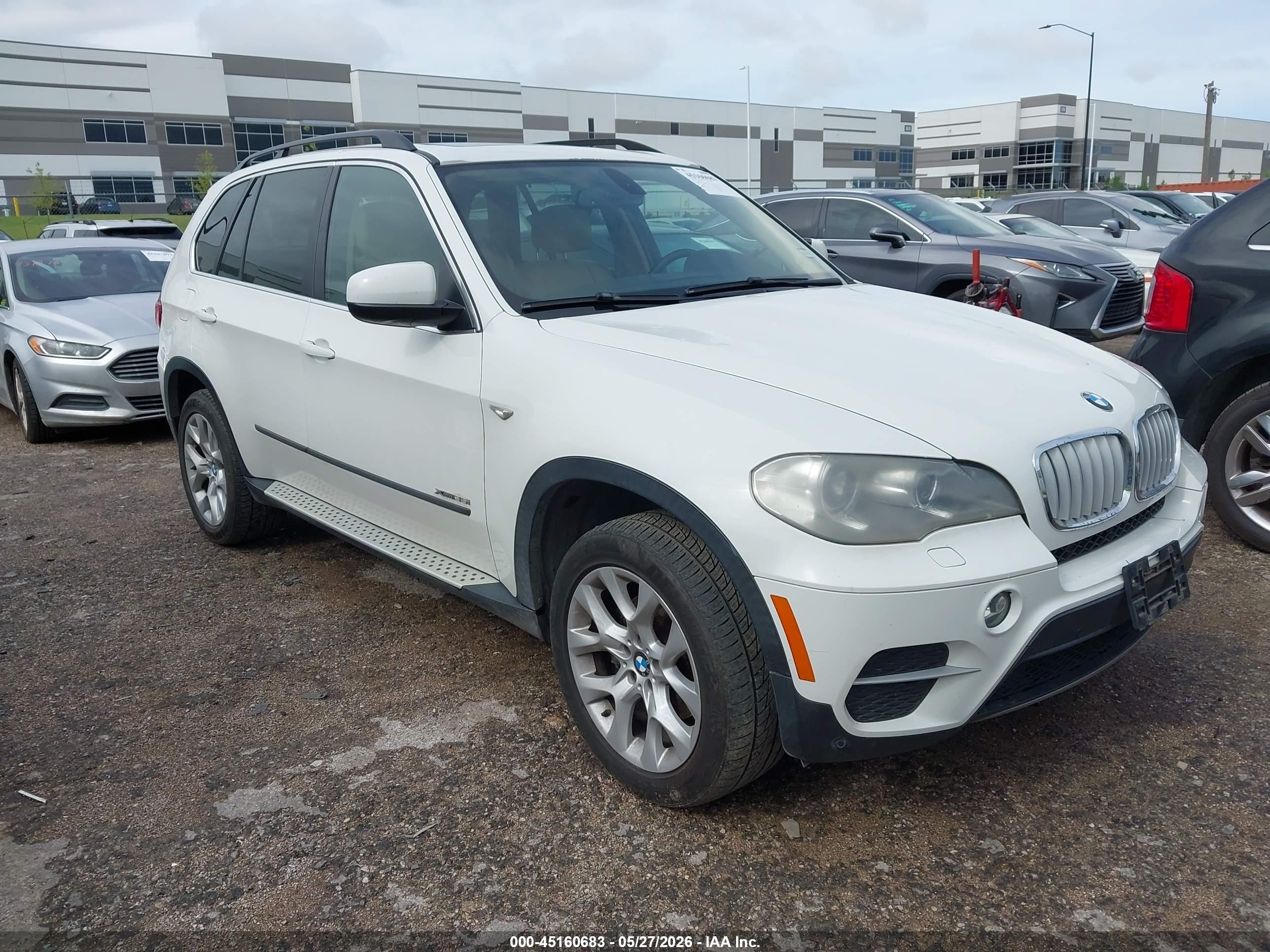 2013 BMW X5 xDrive35i, VIN 5UXZV4C56D0G56377 — Hail