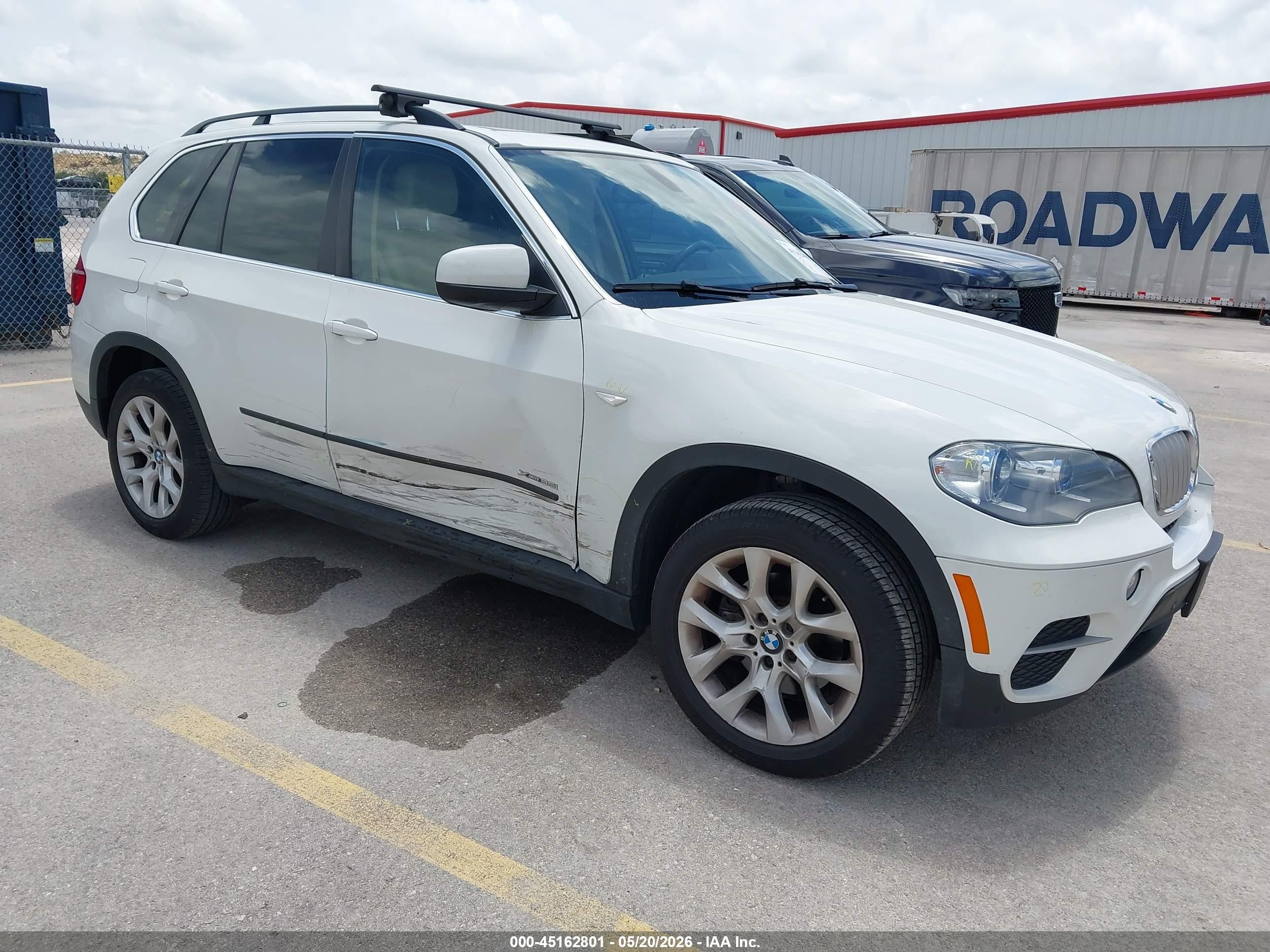 2013 BMW X5 xDrive35i, VIN 5UXZV4C57D0E14472 — Side