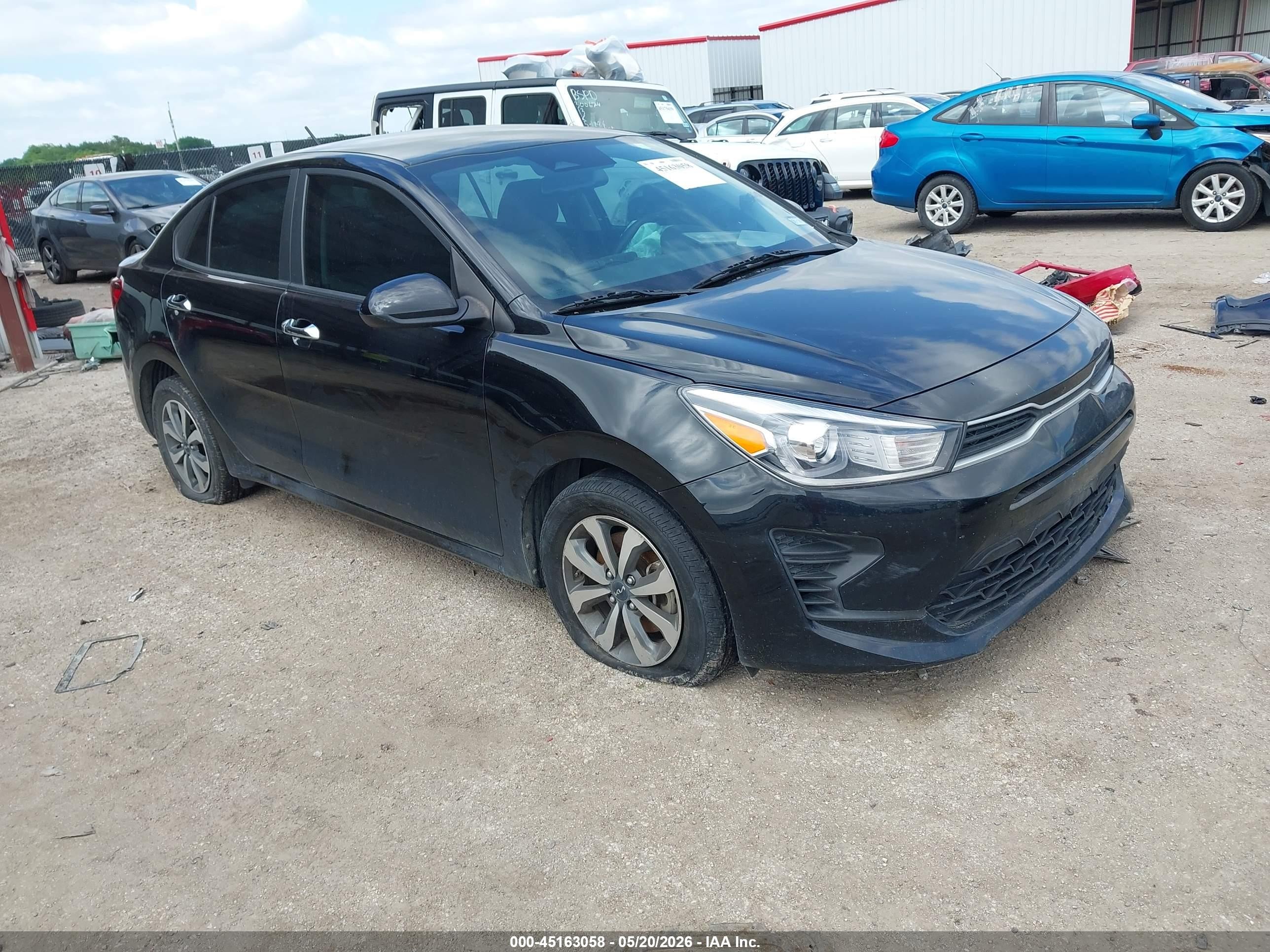 2023 Kia Rio S, VIN 3KPA24AD7PE540633 — Side