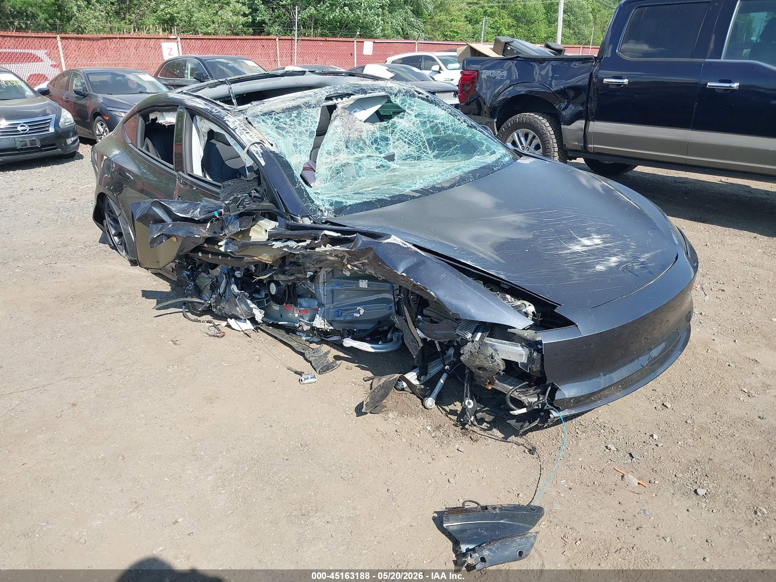 2026 Tesla Model 3 Premium, VIN 5YJ3E1EA1TF147052 — Rollover