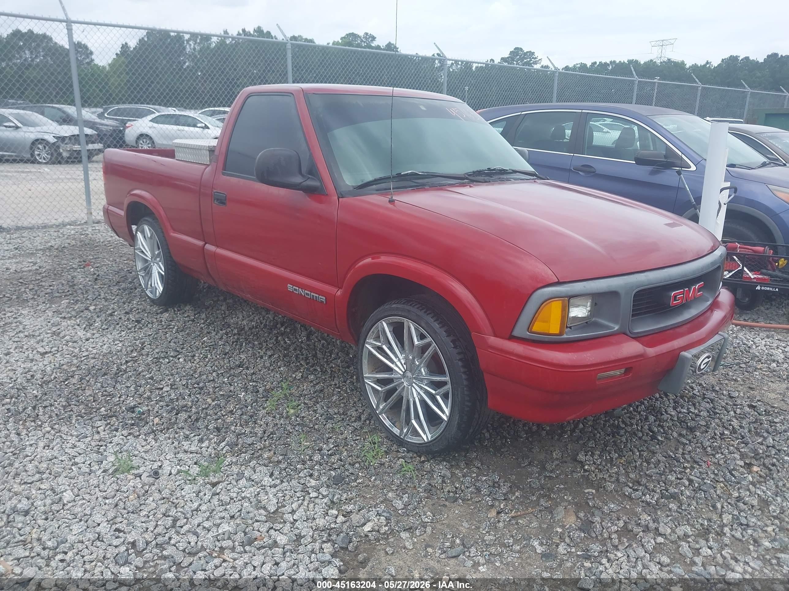 1997 GMC Sonoma, VIN 1GTCS1446VK506468 — Зад