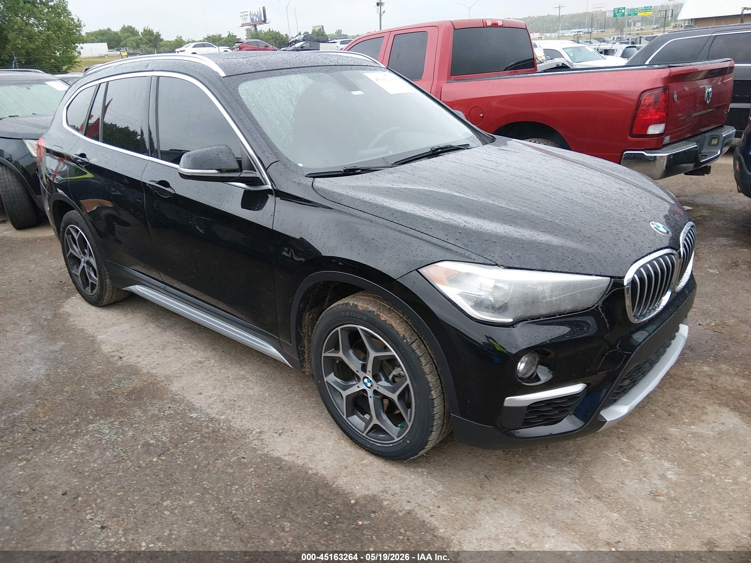 2018 BMW X1 sDrive28i, VIN WBXHU7C38J5L07347 — Hail