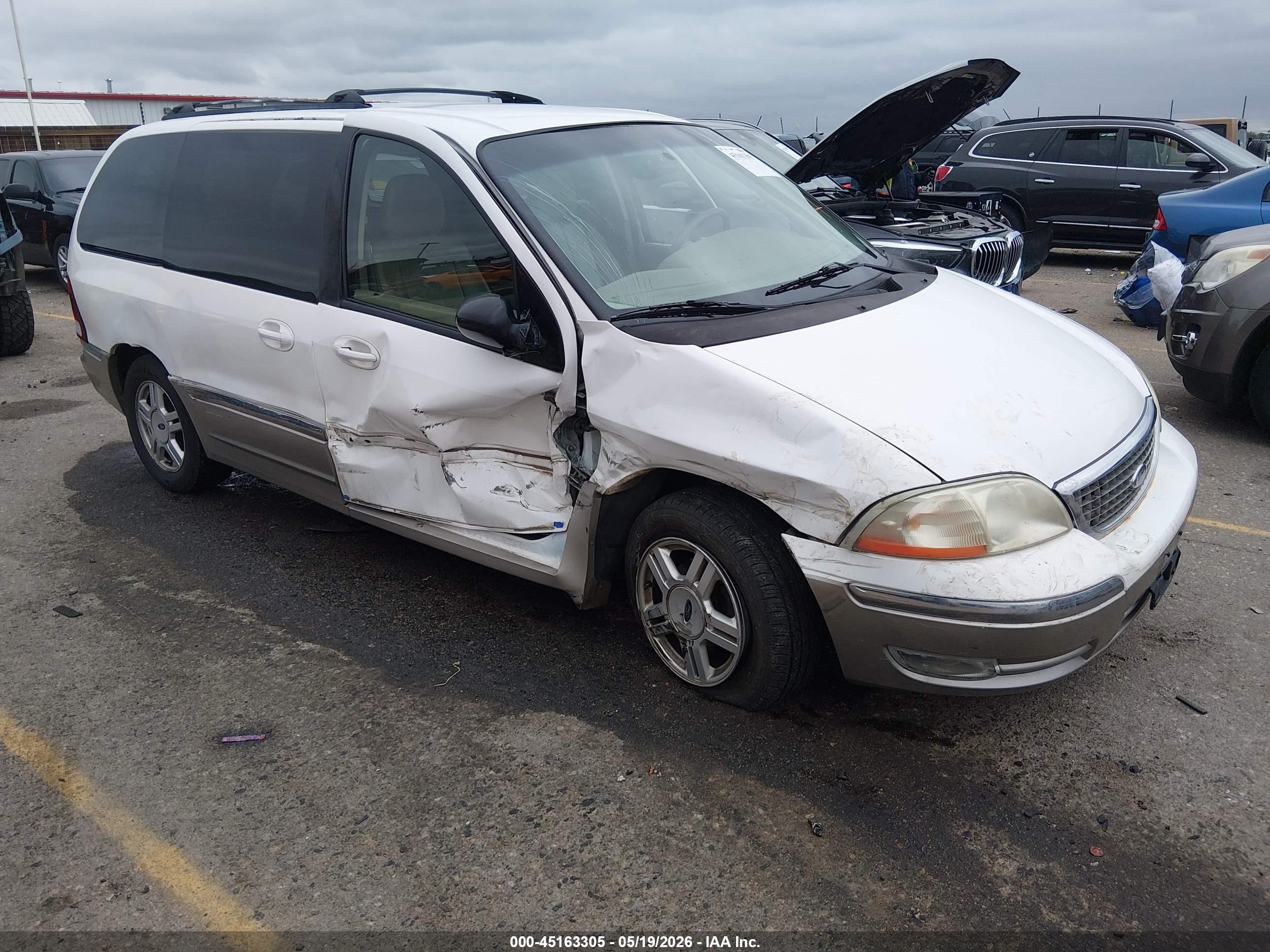 2002 Ford Windstar SEL, VIN 2FMDA53482BA56548 — Side