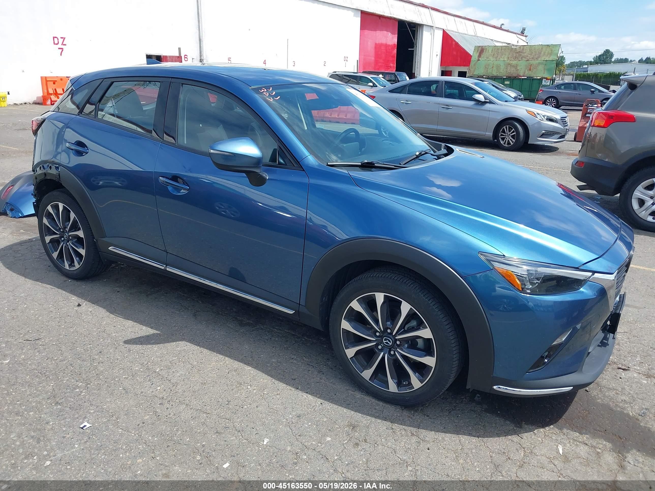 2019 Mazda CX-3 Grand Touring, VIN JM1DKFD71K0428703 — Rear end