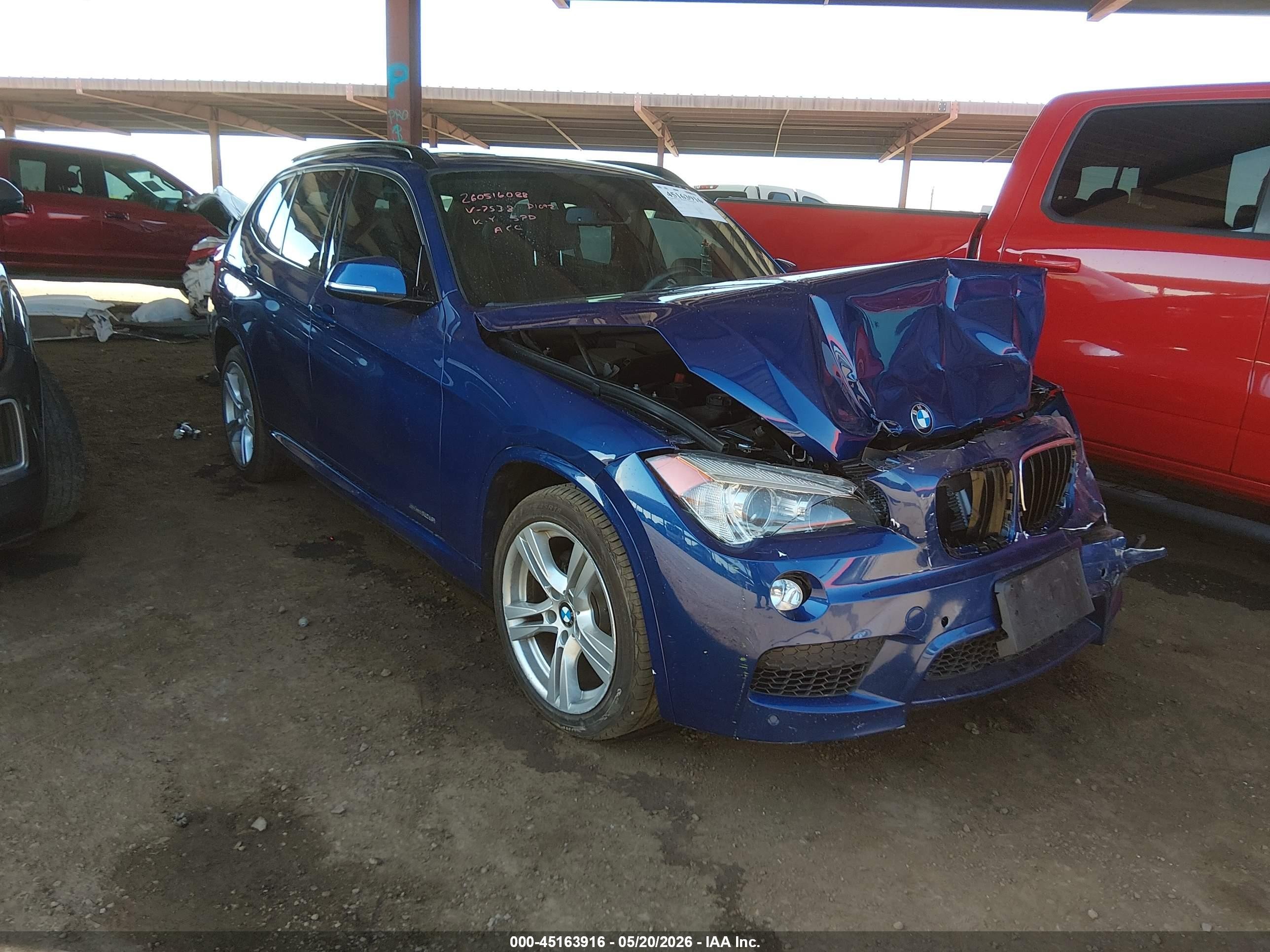 2015 BMW X1 sDrive28i, VIN WBAVM1C56FV317538 — Front end