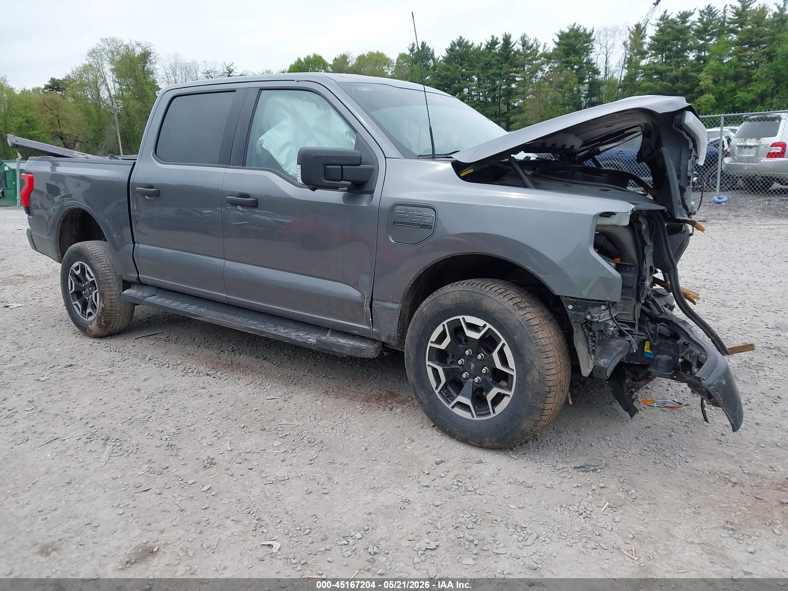 2023 Ford F-150 Lightning Pro, VIN 1FTVW1EL8PWG62719 — Front end