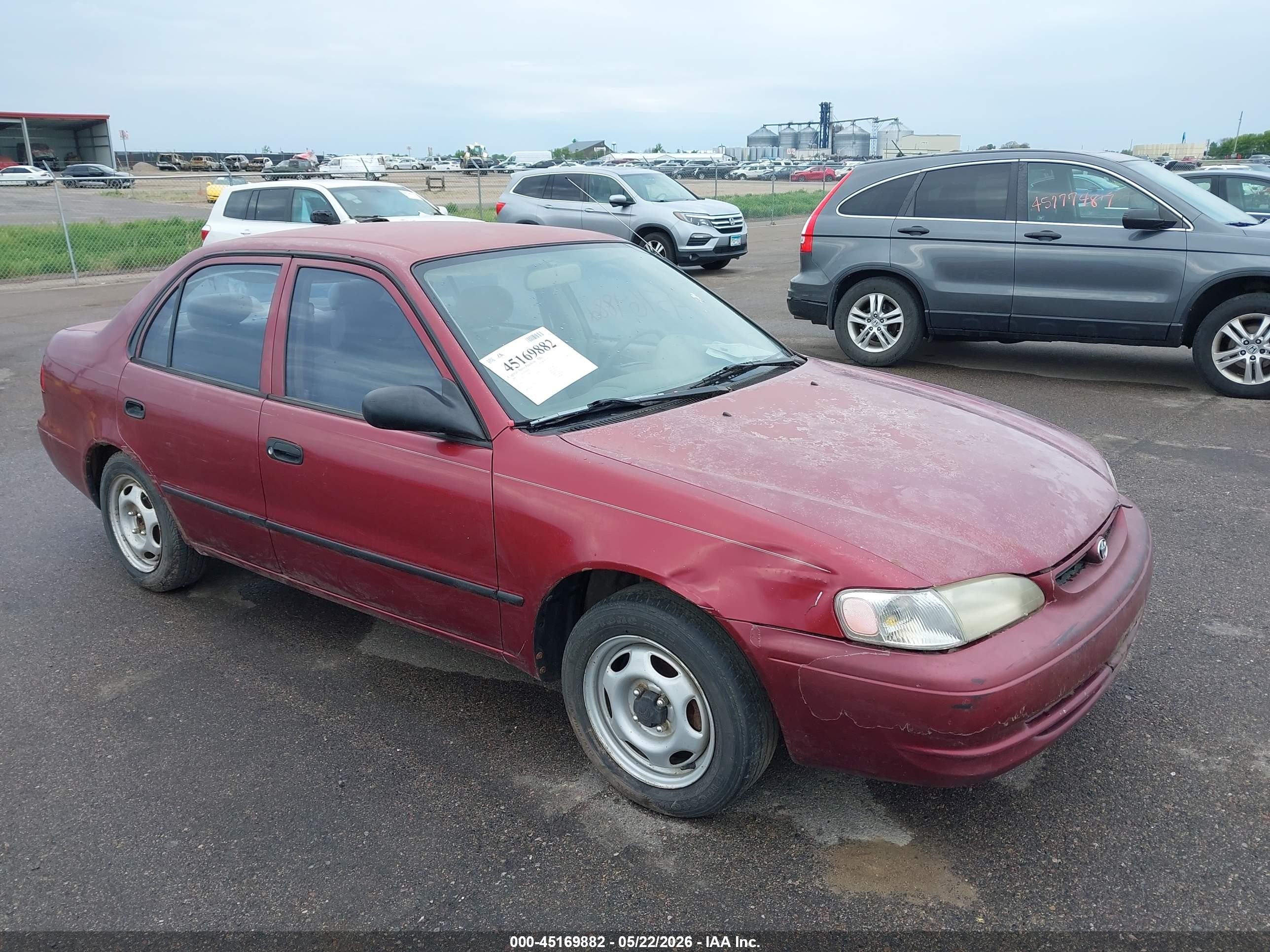 1999 Toyota Corolla CE, VIN 1NXBR12E7XZ285257 — Front end