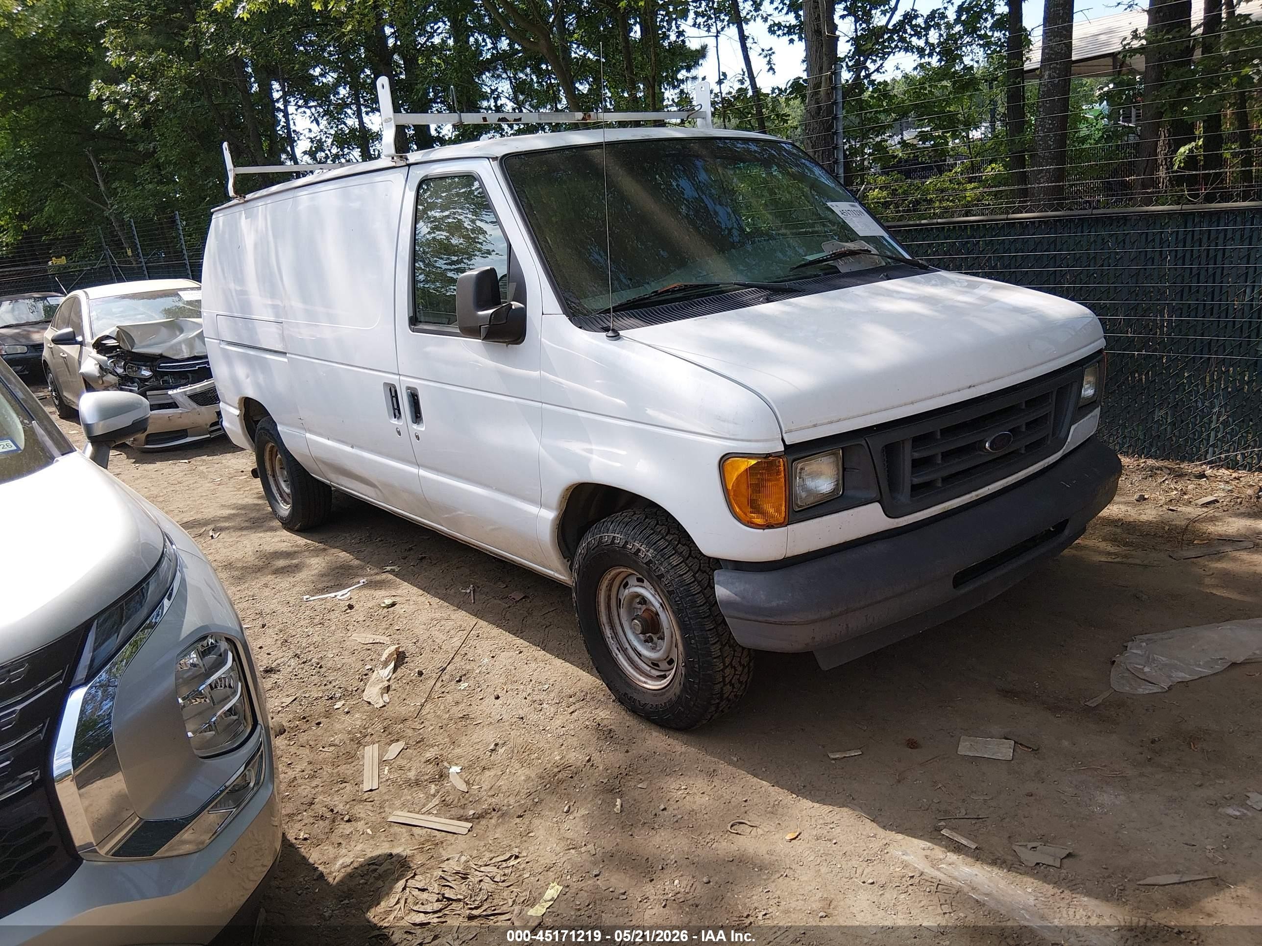 2003 Ford E-150, VIN 1FTRE14LX3HA75085 — Normal wear