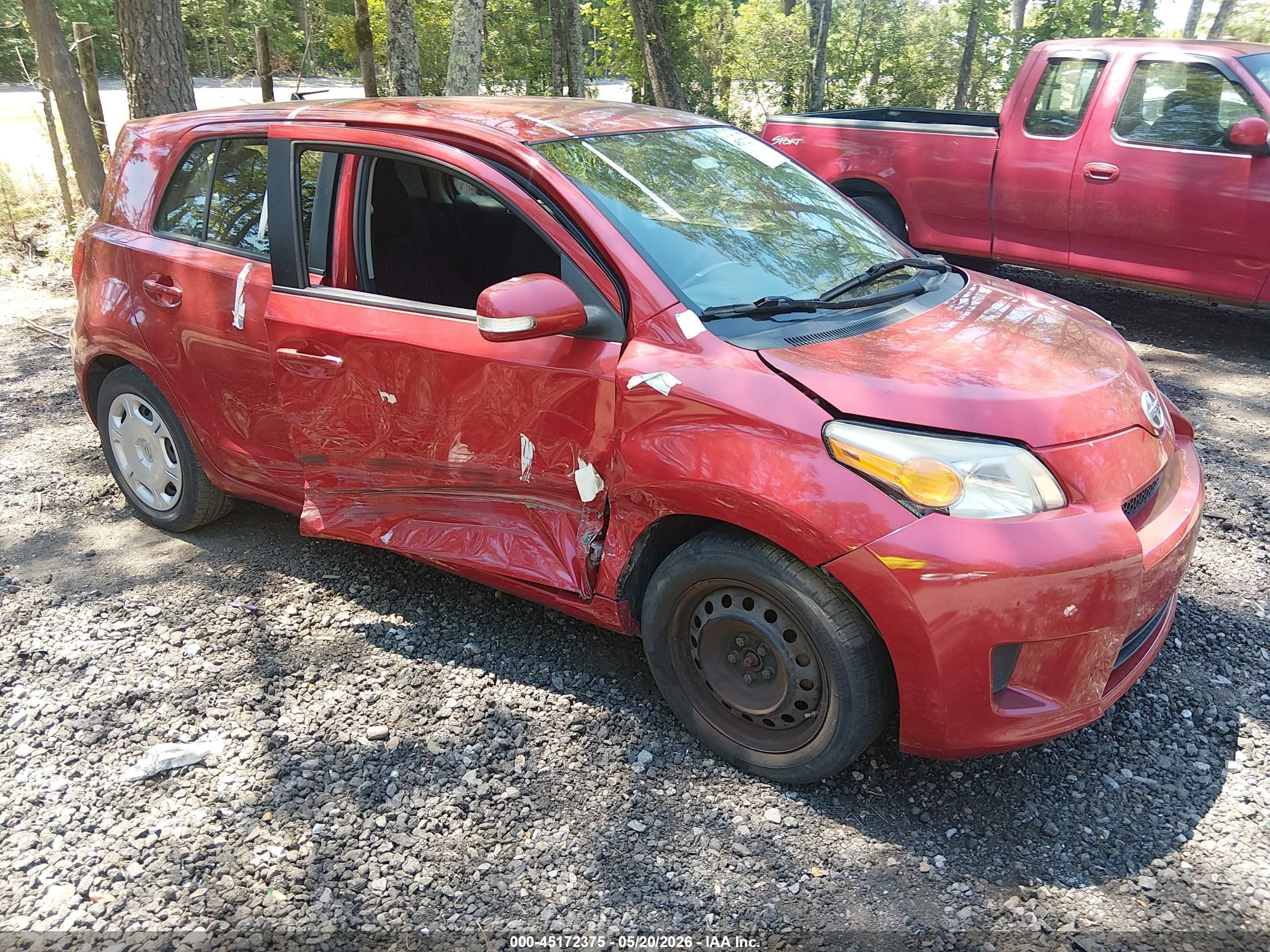 2013 Scion xD, VIN JTKKUPB48D1035643 — Side