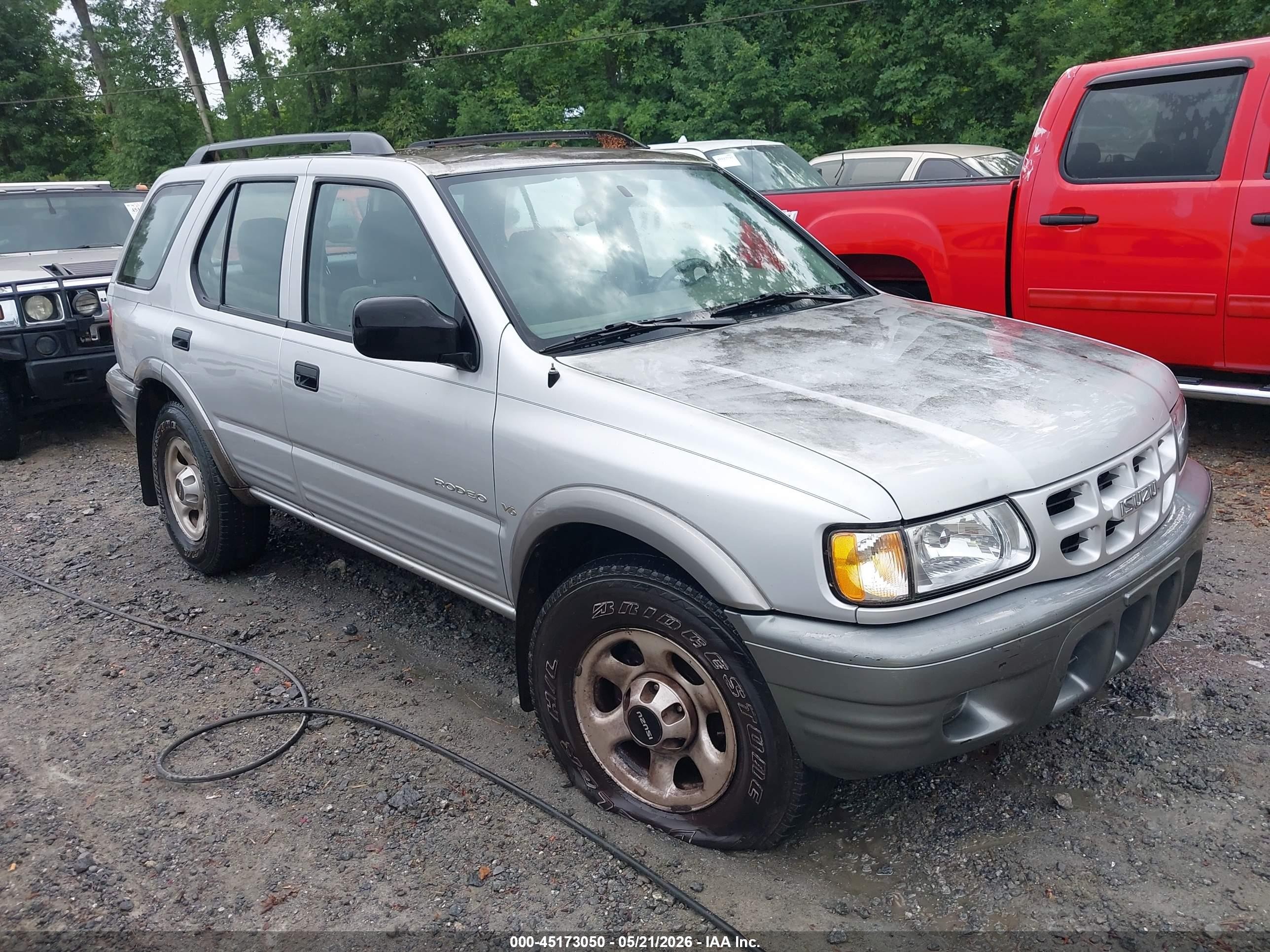 2000 Isuzu Rodeo S, VIN 4S2CK58W9Y4342164 — Бок