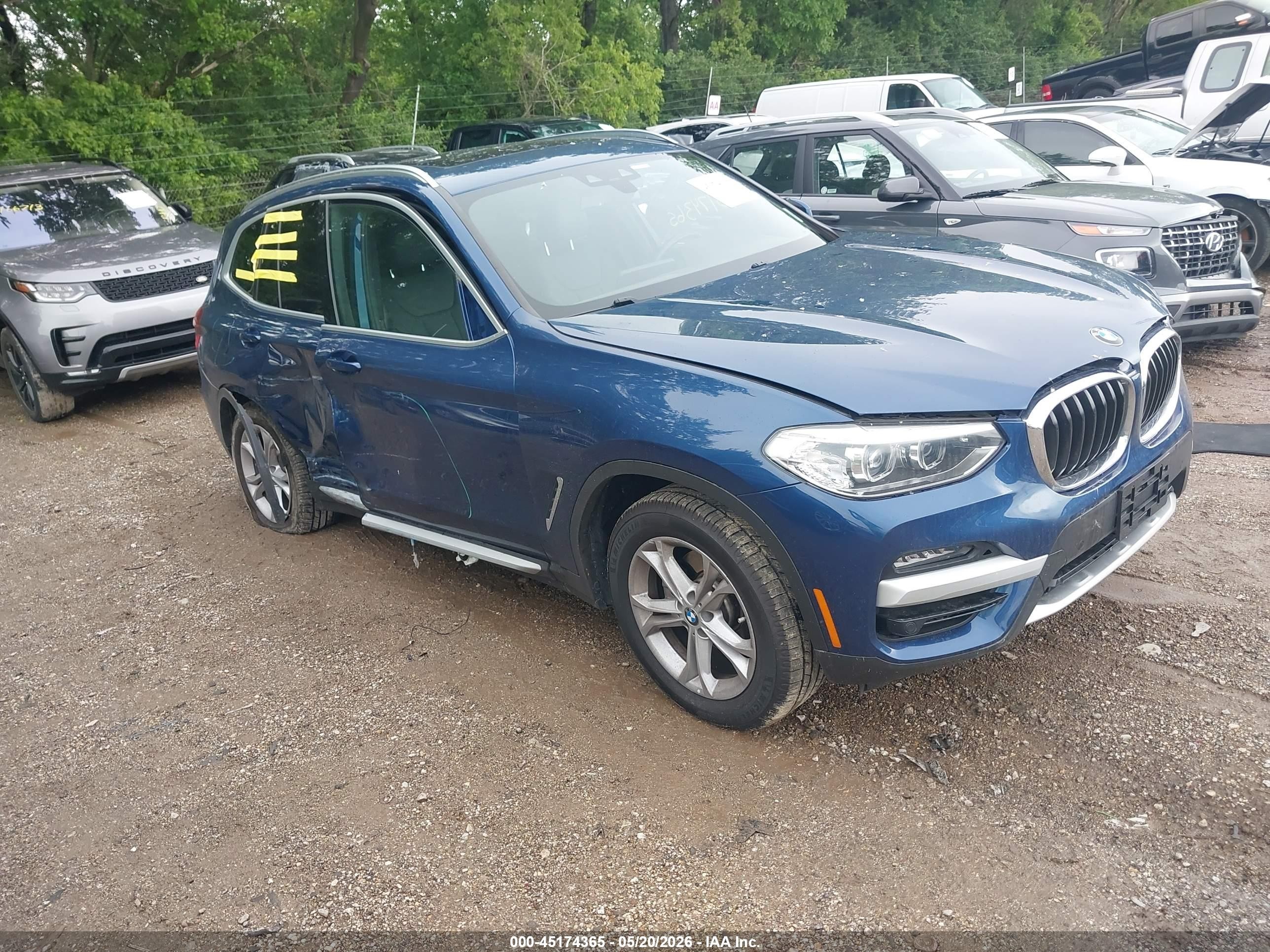 2021 BMW X3 xDrive30i, VIN 5UXTY5C02M9E07061 — Side