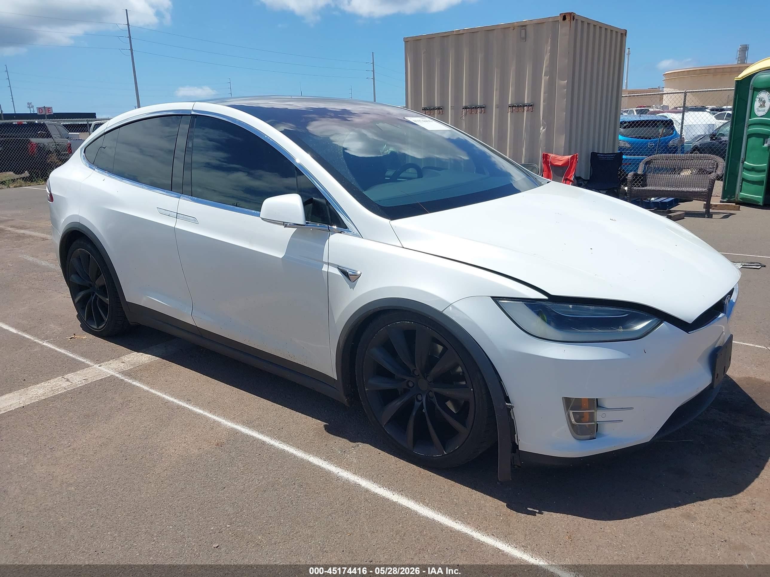 2017 Tesla Model X 90D, VIN 5YJXCBE22HF055218 — Side