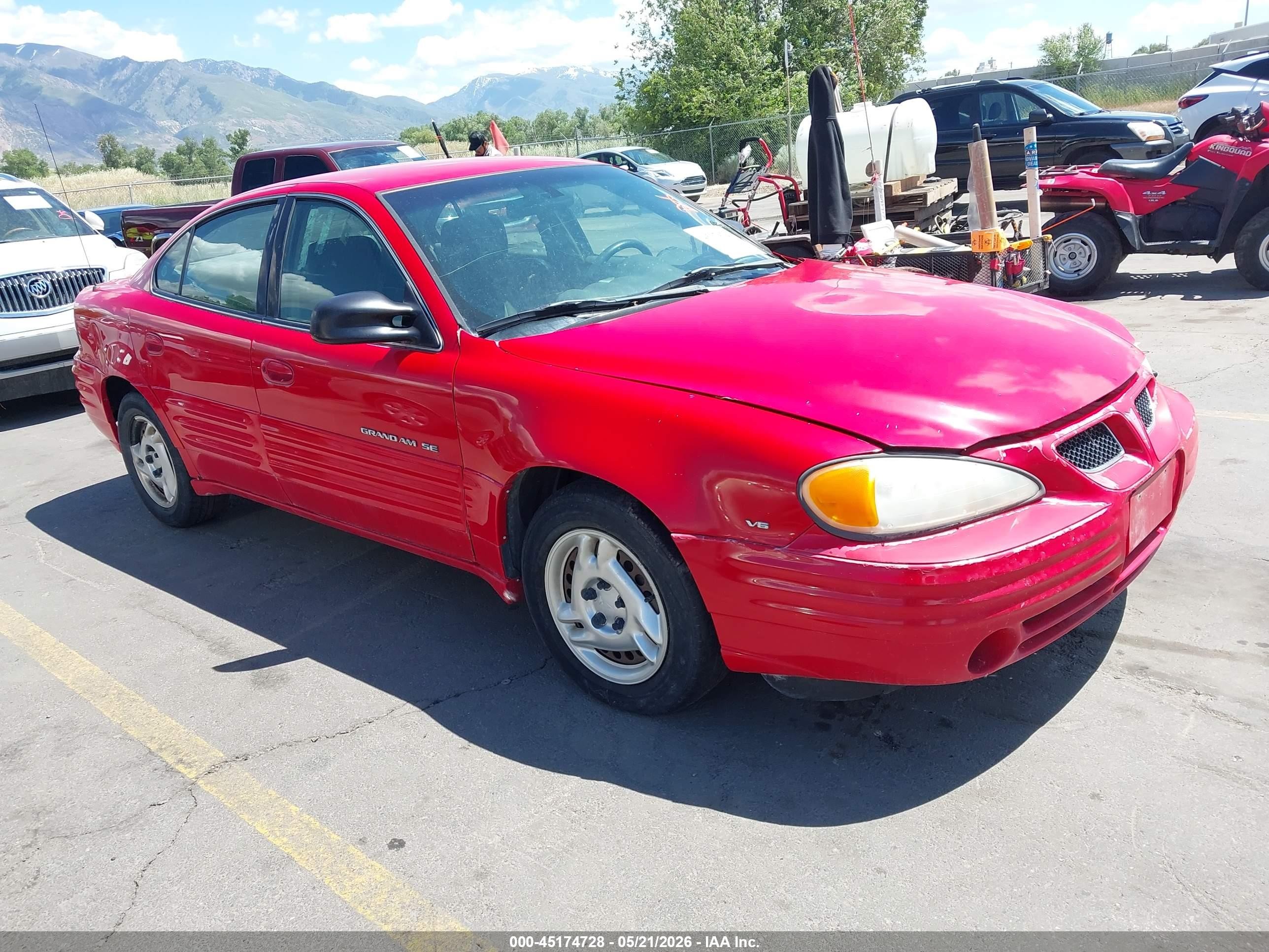 1999 Pontiac Grand Am SE1, VIN 1G2NE52E4XC564289 — Normal wear