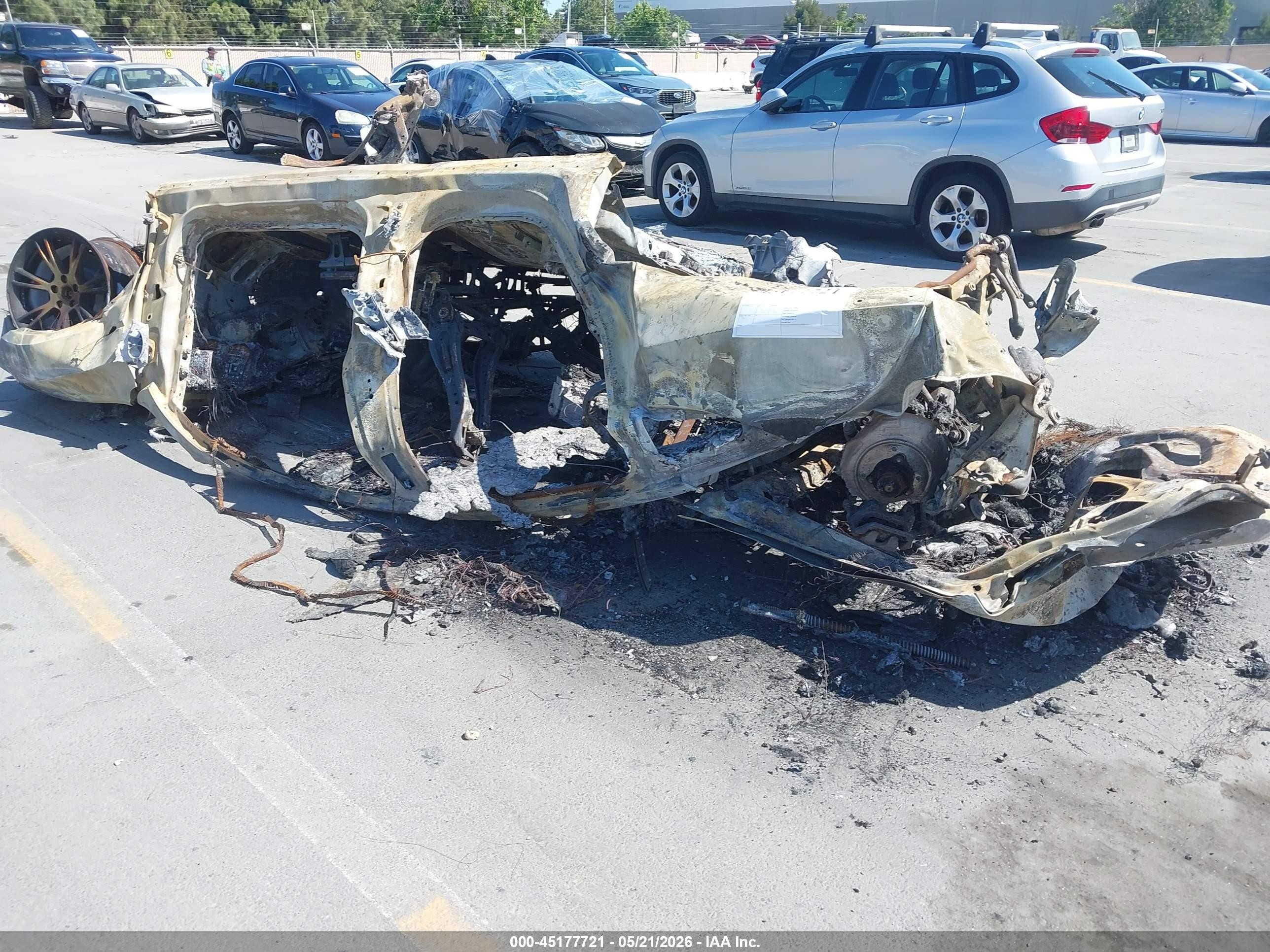 2024 Tesla Model Y Long Range, VIN 7SAYGDEE6RF069299 — Burn