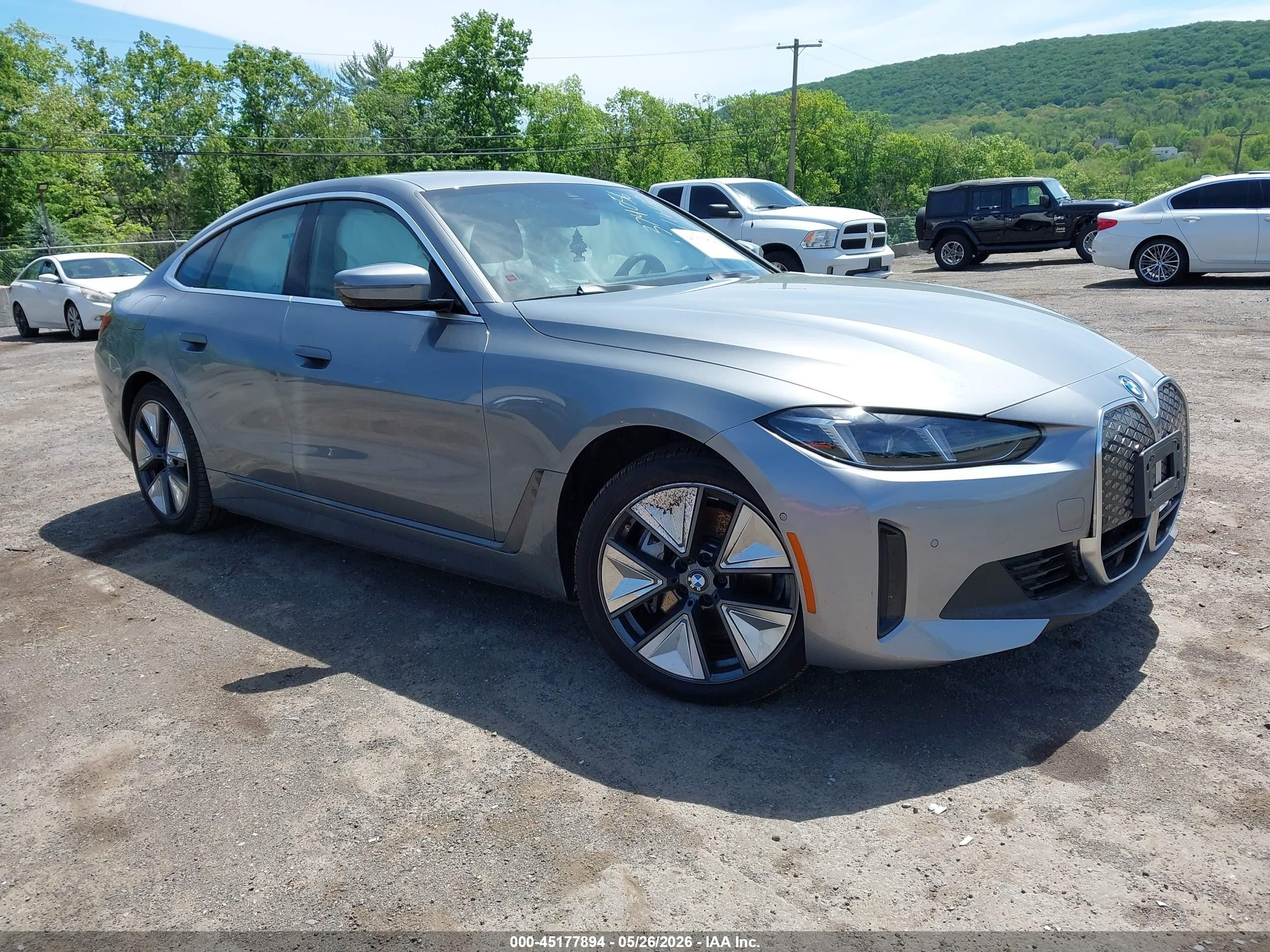 2025 BMW i4 xDrive40, VIN WBY43HD00SFU16338 — Side