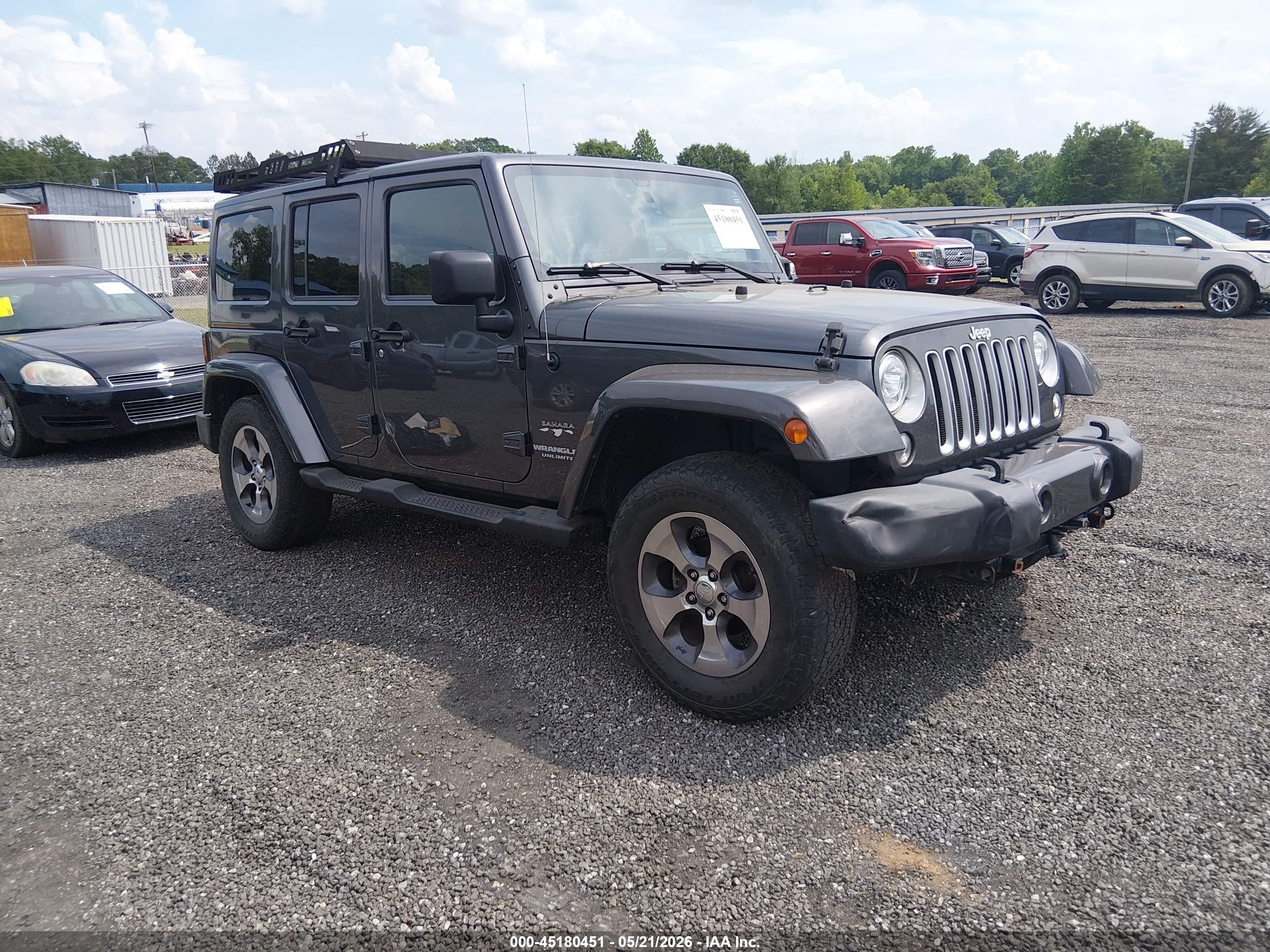 2017 Jeep Wrangler Unlimited Sahara, VIN 1C4HJWEG7HL752152 — Side