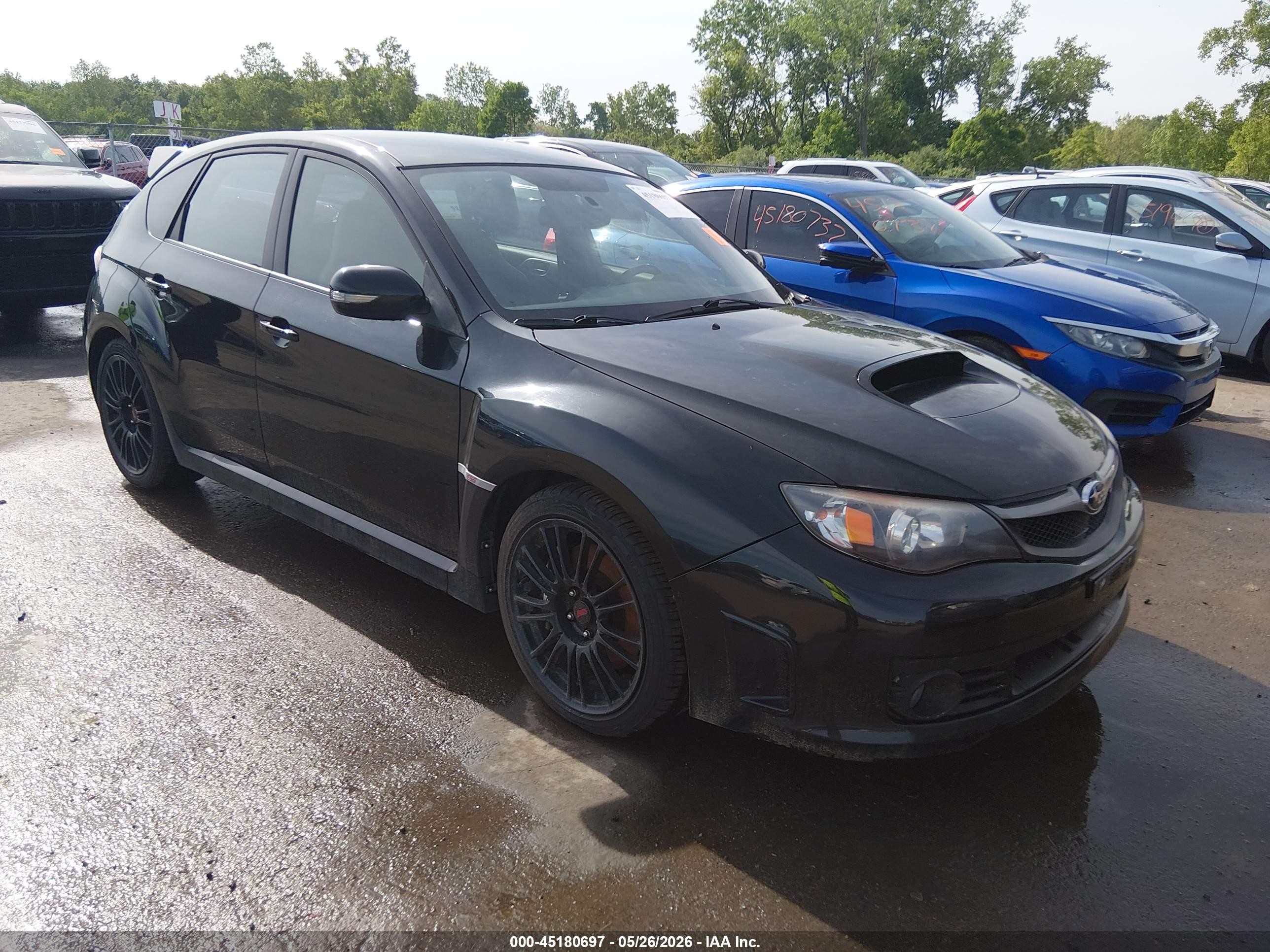 2009 Subaru WRX STI, VIN JF1GR89679L823228 — Град
