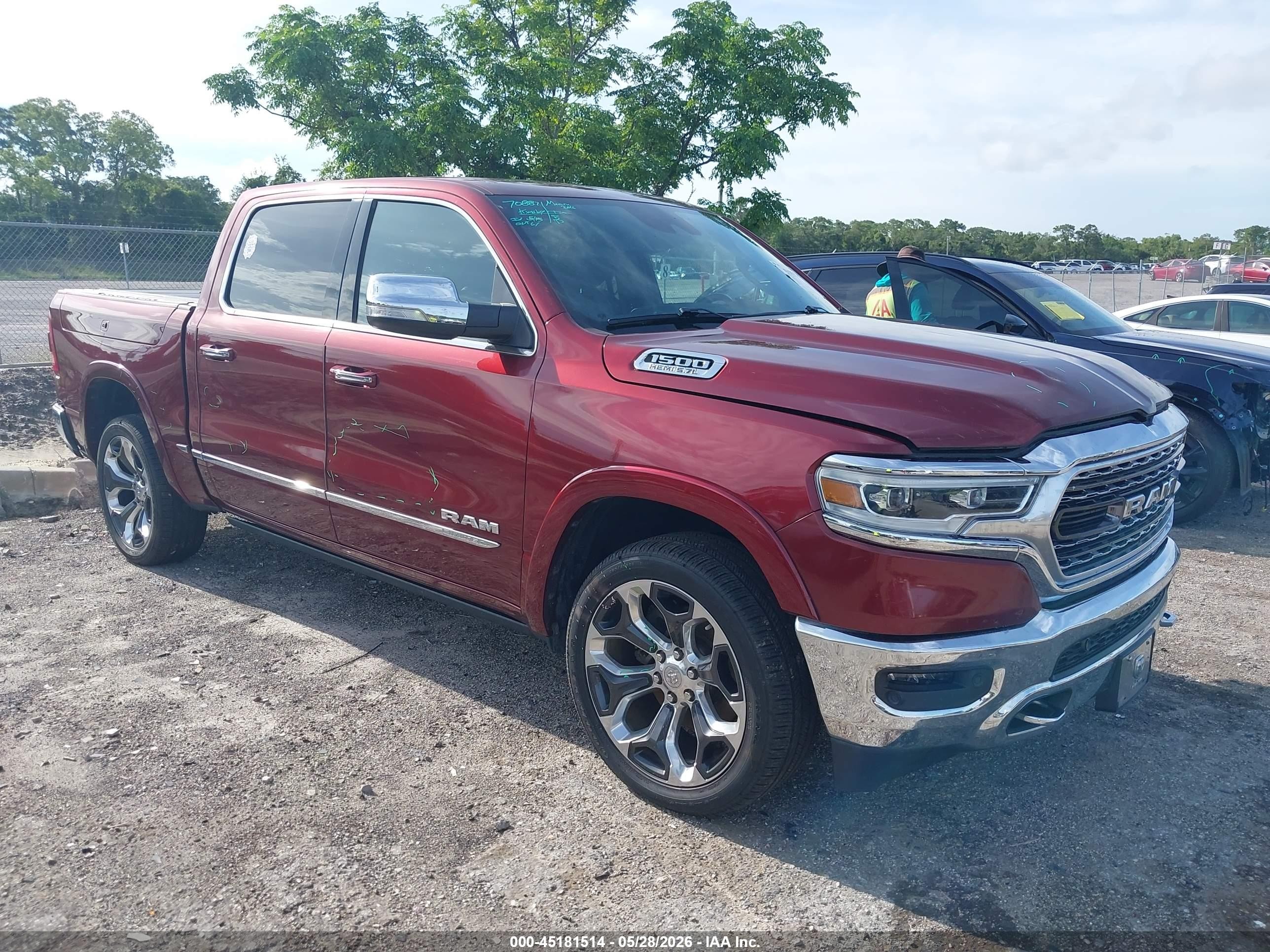 2019 Ram 1500 Limited, VIN 1C6RREHT2KN666170 — Storm
