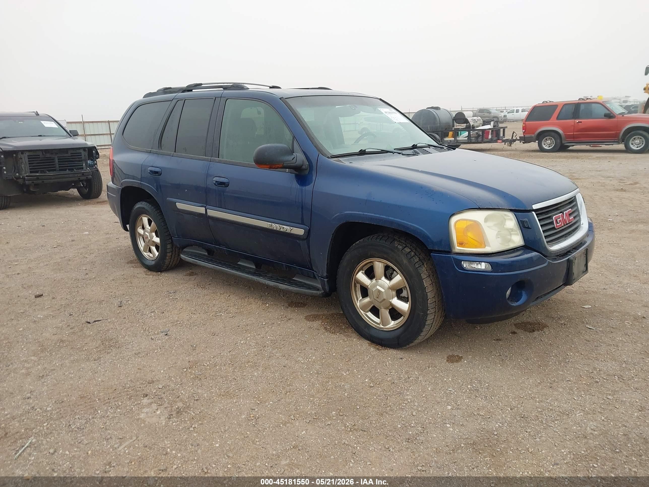 2002 GMC Envoy SLE, VIN 1GKDT13SX22435941 — Rear end