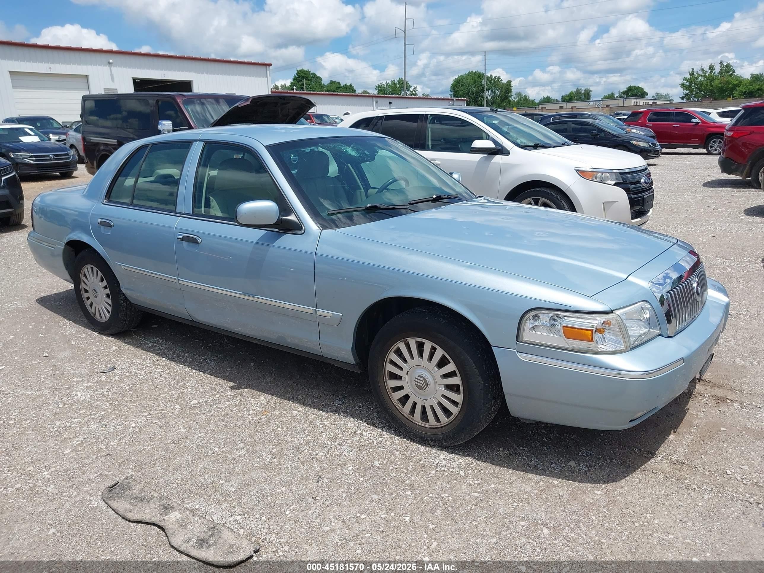 2007 Mercury Grand Marquis LS, VIN 2MEFM75V17X601021 — Hail