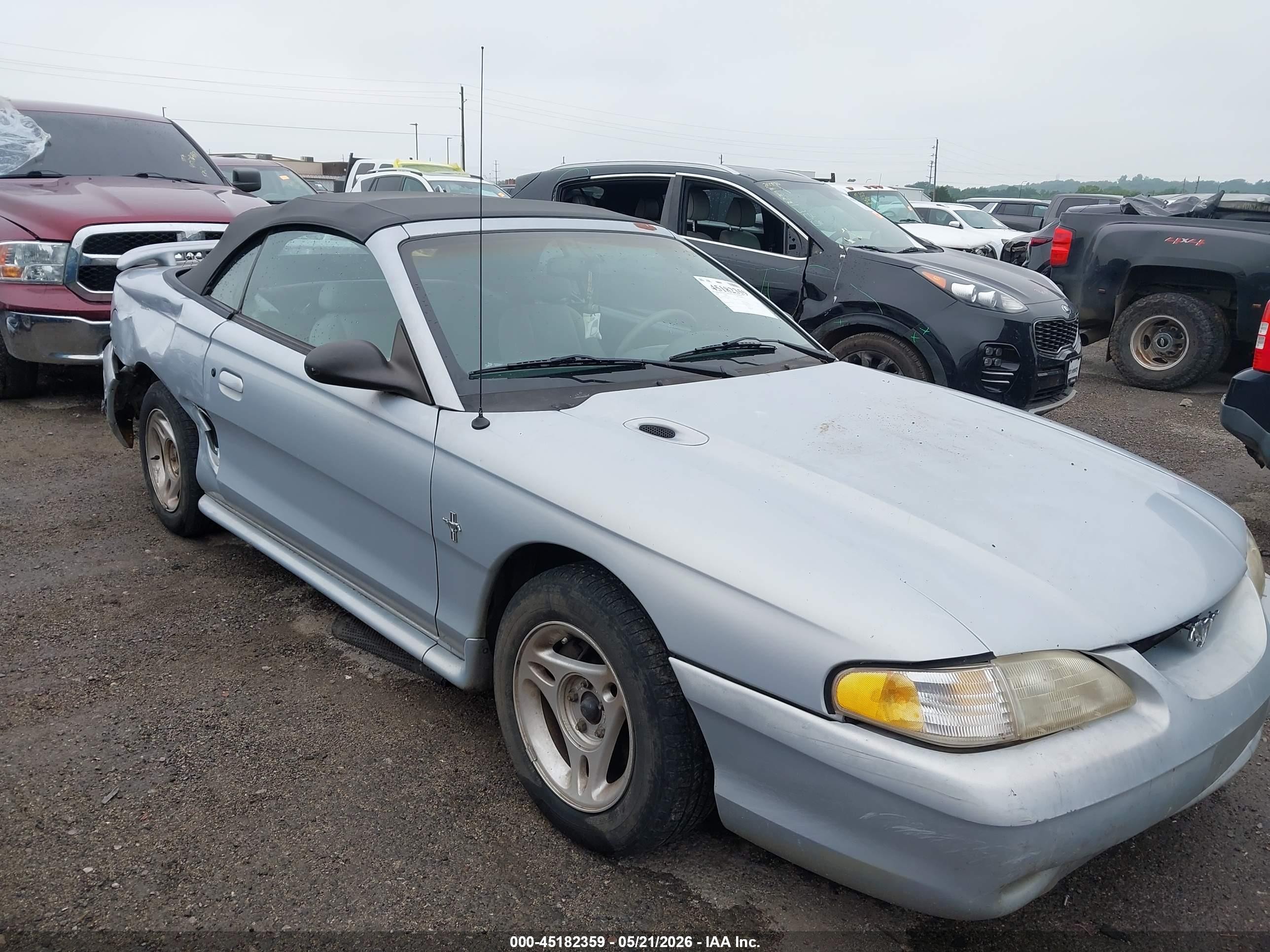 1996 Ford Mustang, VIN 1FALP4443TF203050 — Side