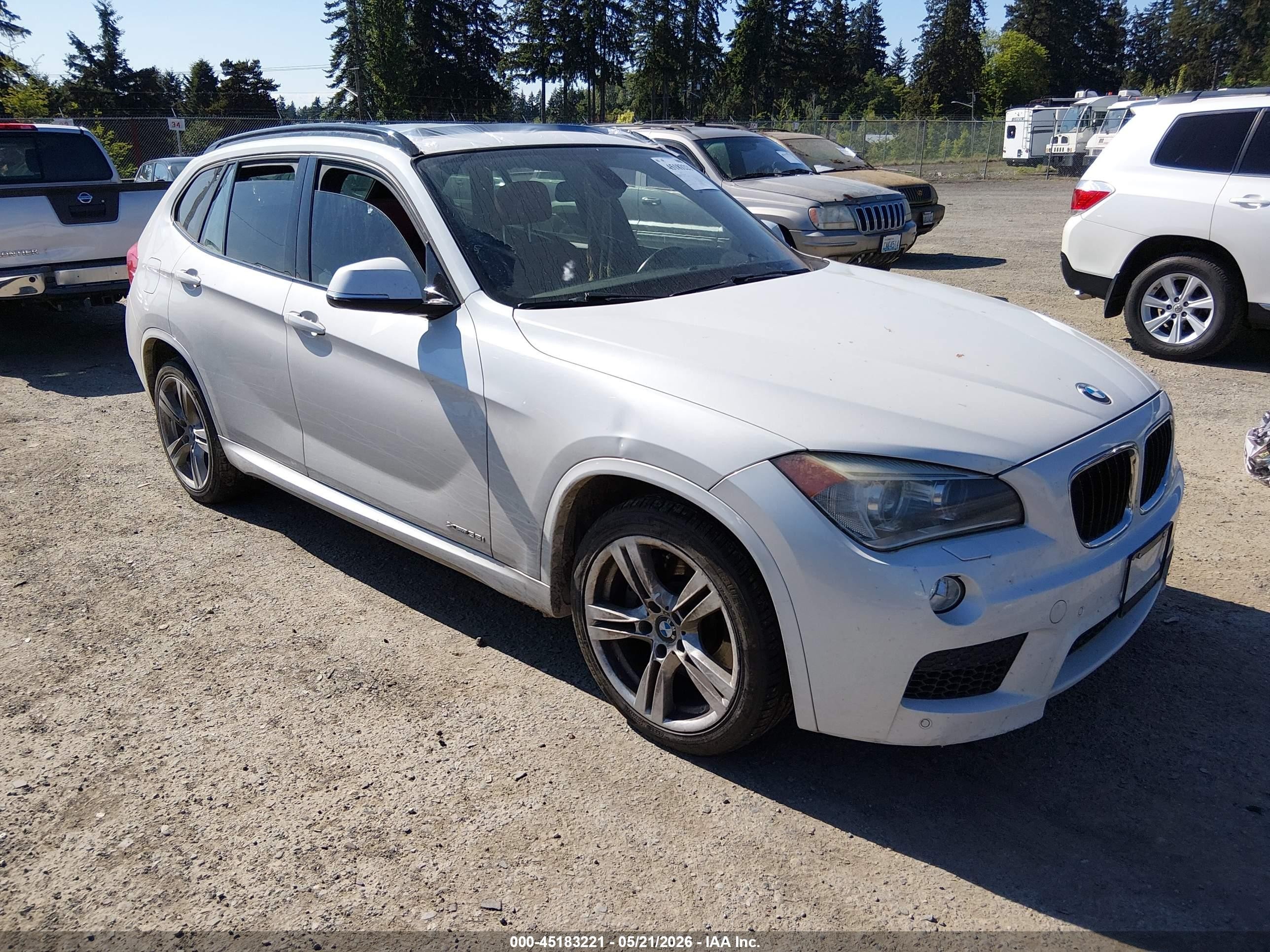 2013 BMW X1 xDrive35i, VIN WBAVM5C52DVV89671 — Rear end