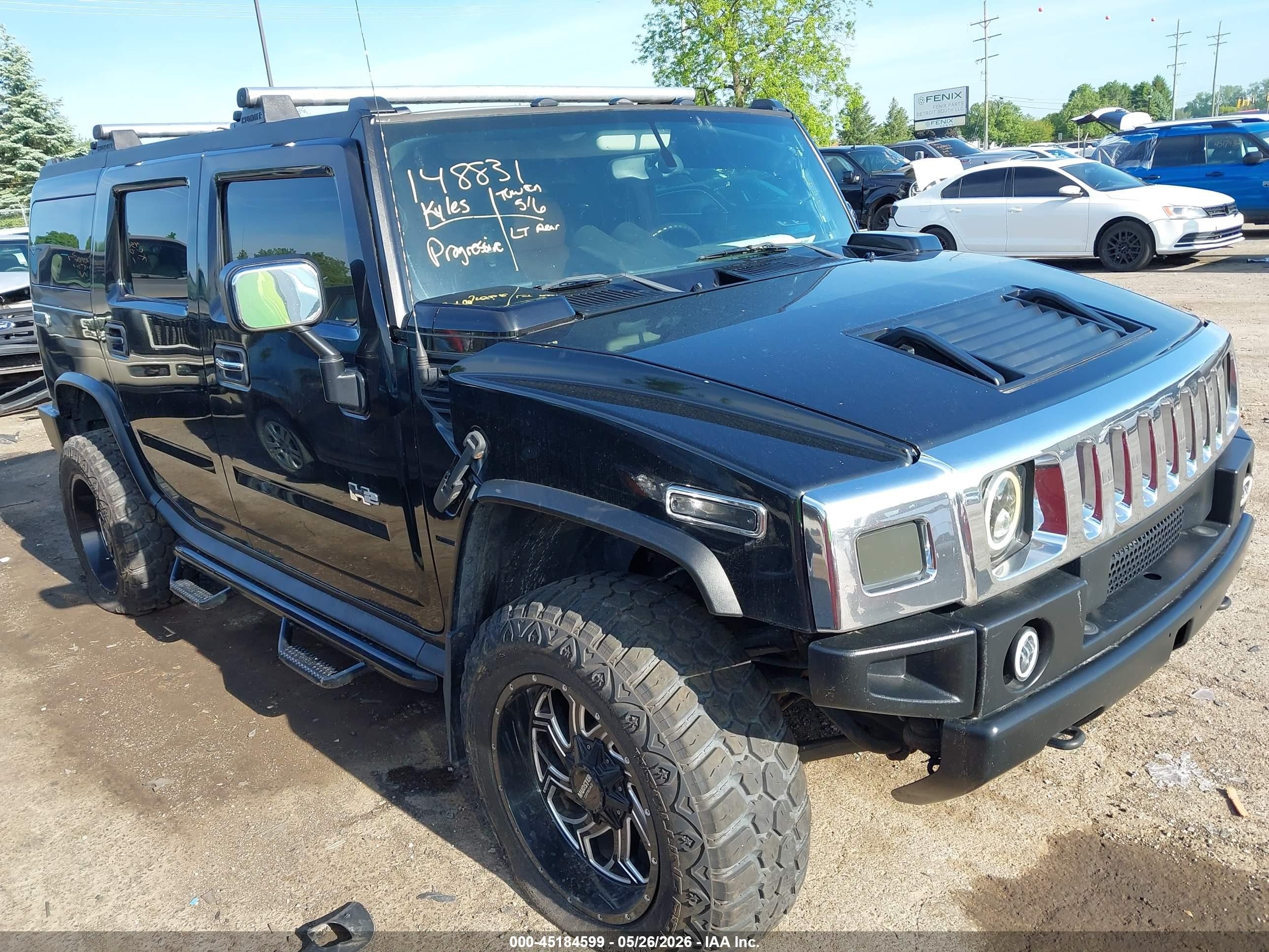 2005 Hummer H2 SUV, VIN 5GRGN23U35H124569 — Rear end
