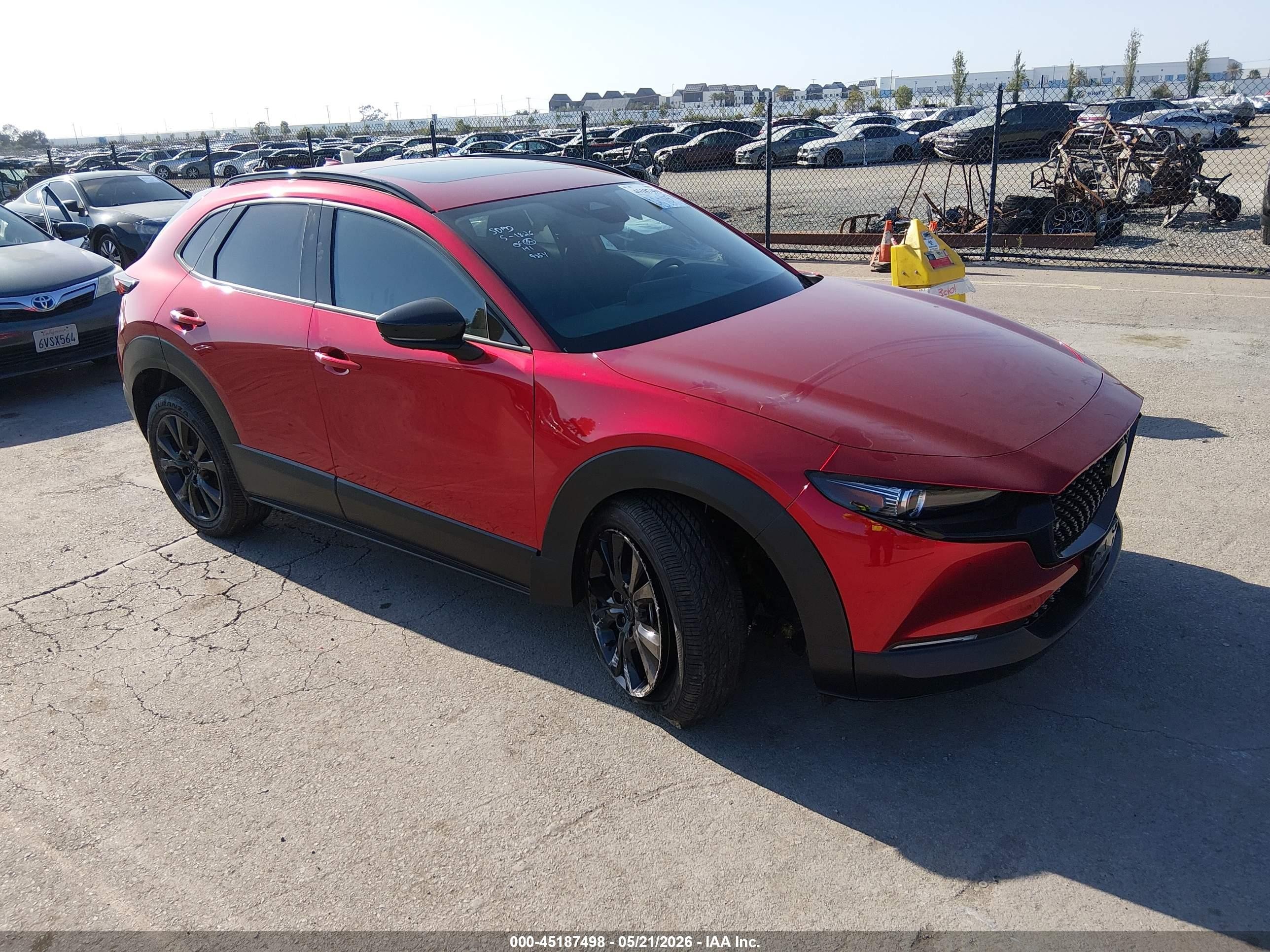2026 Mazda CX-30 Premium Plus, VIN 3MVDMBEY4TM109254 — Front end